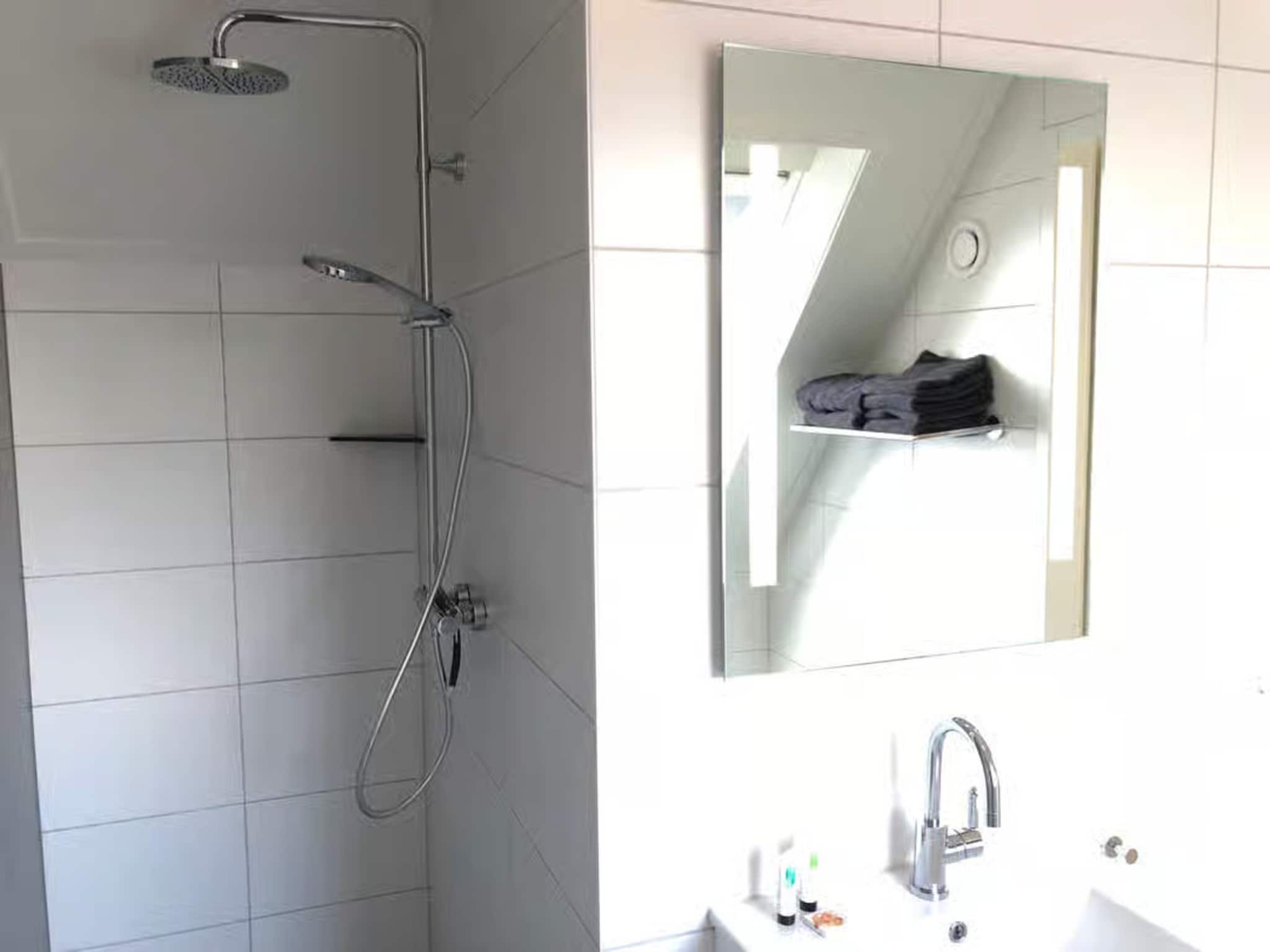 De badkamer van Plein 40 Lodge 20 in Zoutelande