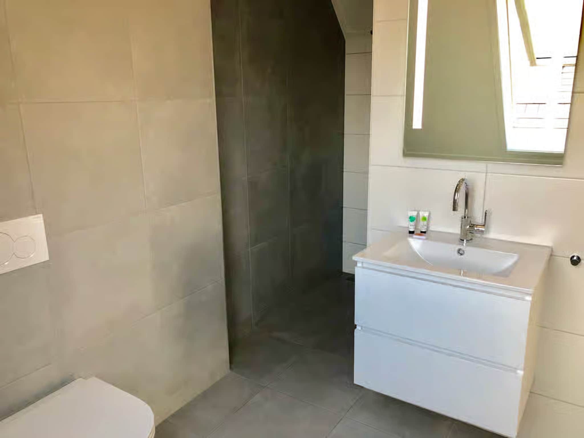 De badkamer van Plein 40 Lodge 20 in Zoutelande