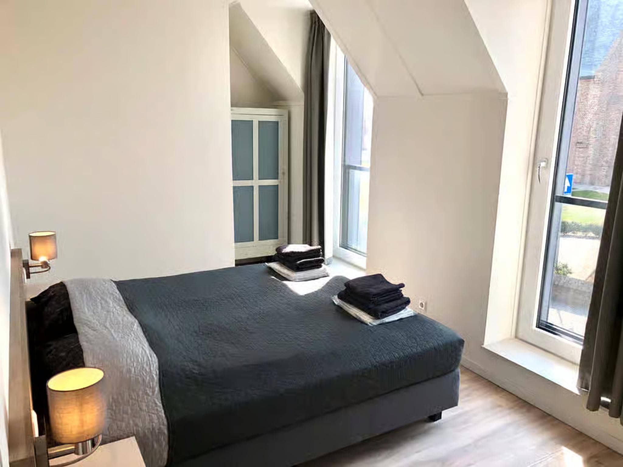 Een slaapkamer van Plein 40 Lodge 20 in Zoutelande