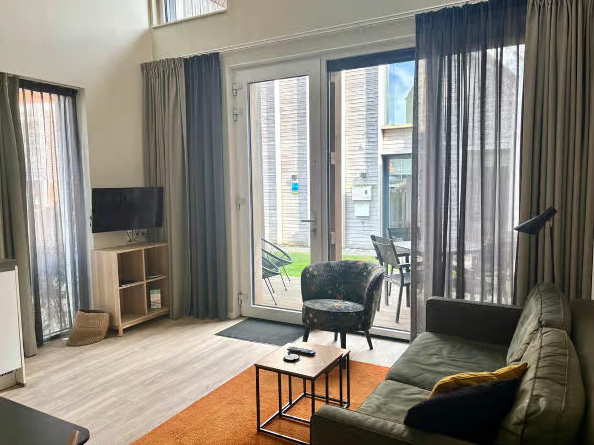 De woonkamer van Plein 40 Lodge 26 in Zoutelande