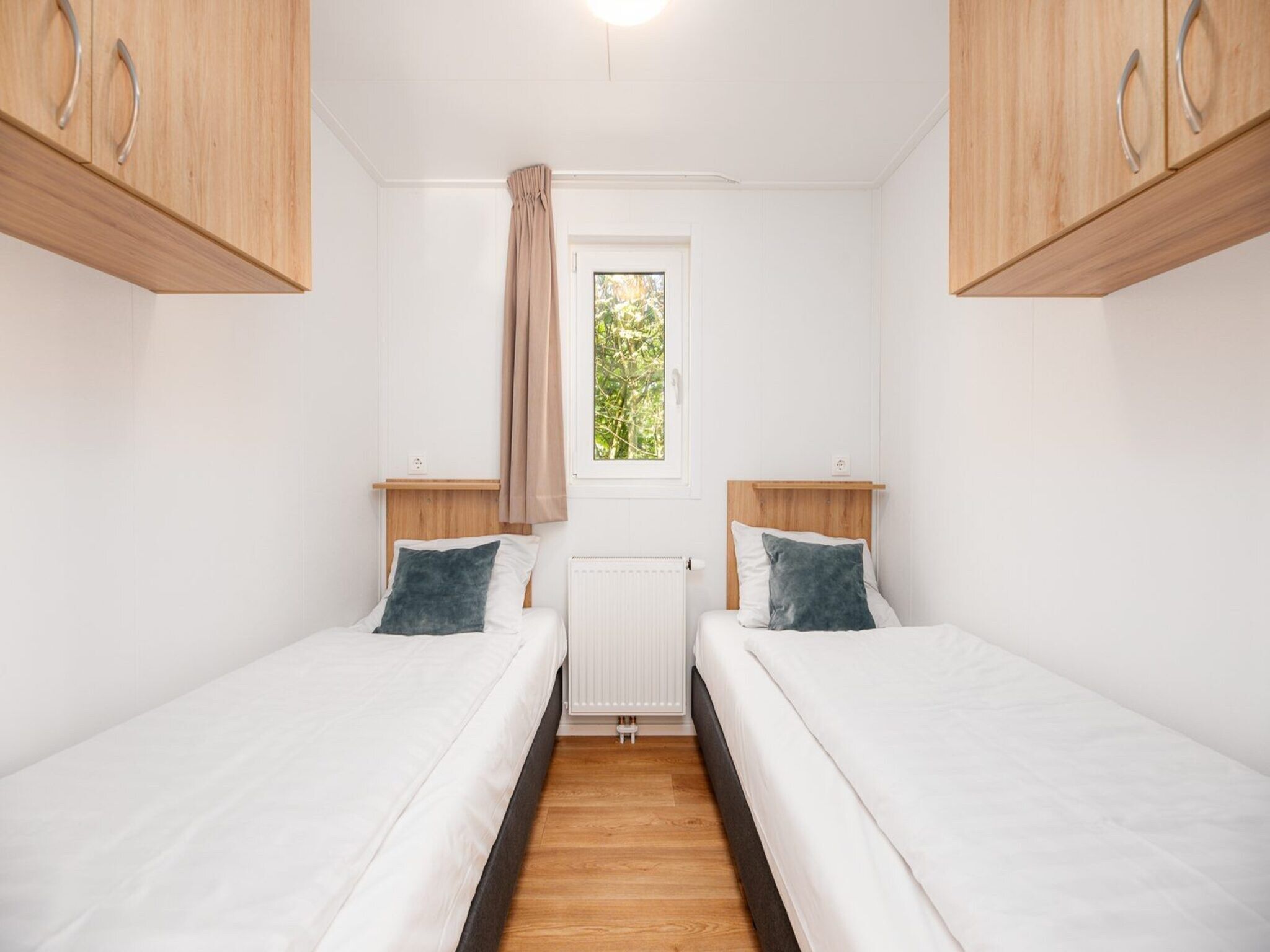 Een slaapkamer van River Cabin with bubbeltub | 6 people in Zuna