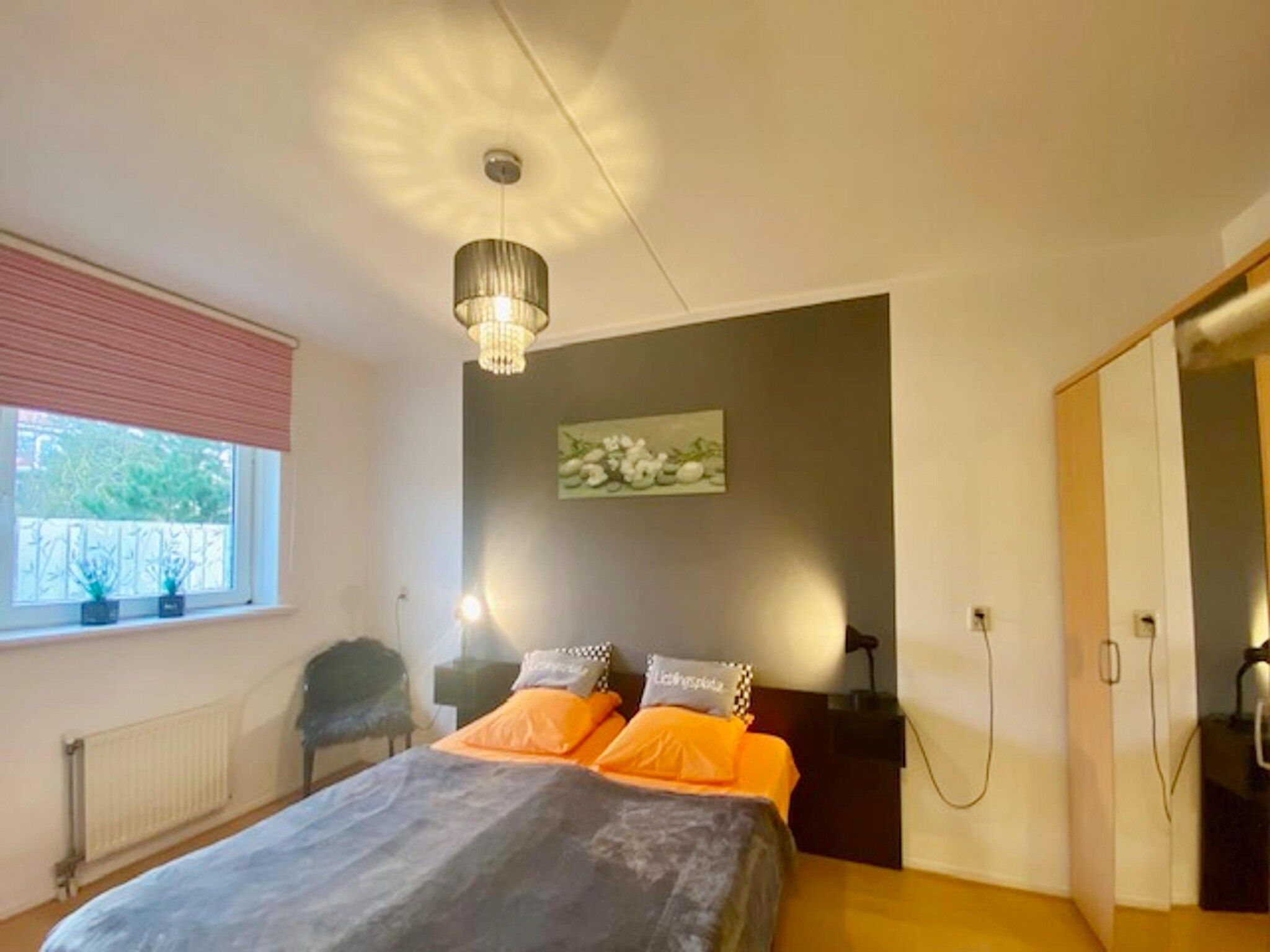 Een slaapkamer van Résidence Juliana 21 in Julianadorp aan Zee