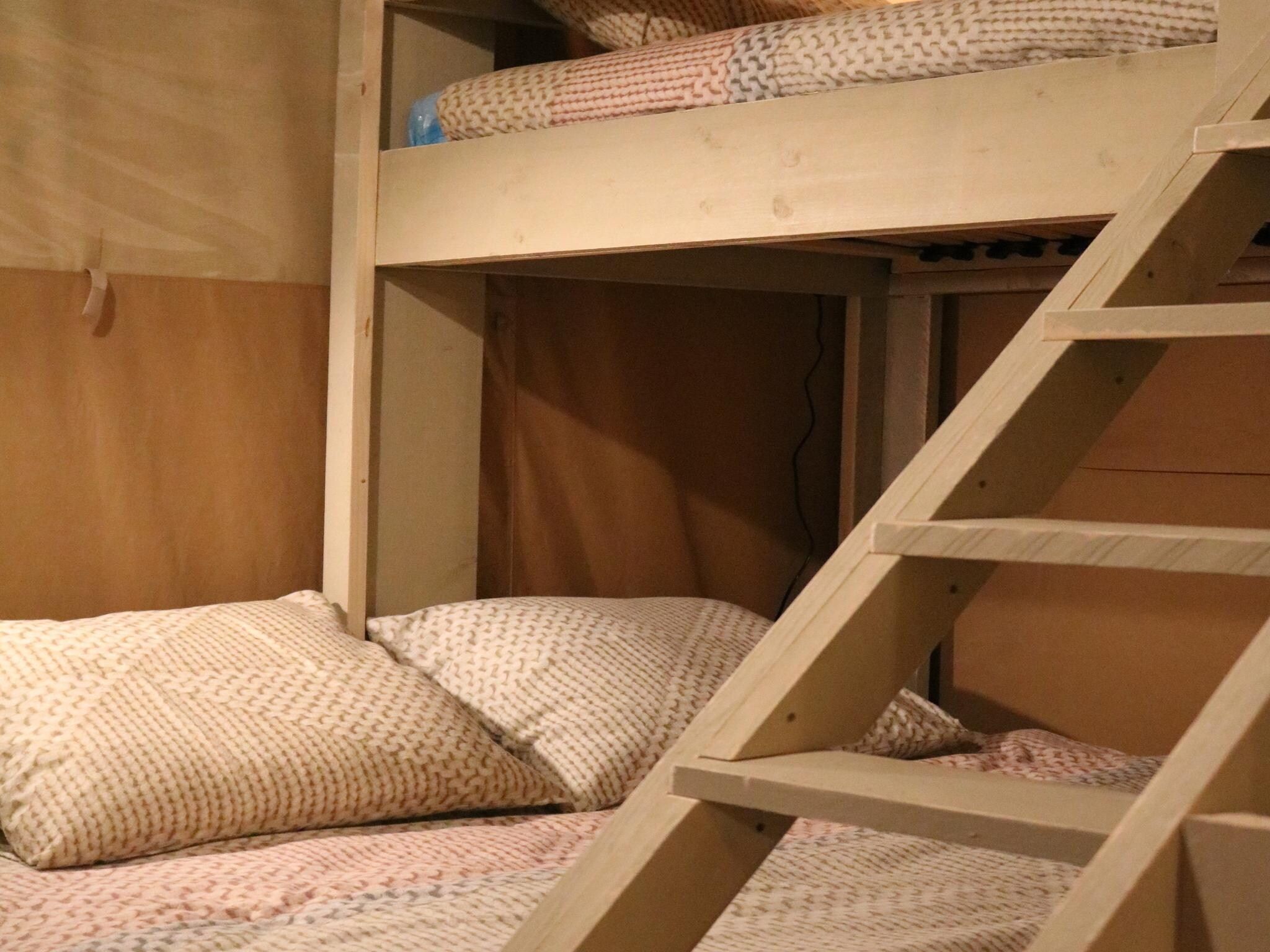 Een slaapkamer van Safari tent l 7 persoons in Balkbrug