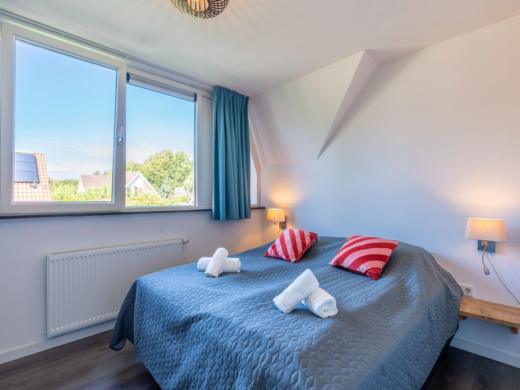 Een slaapkamer van Hoogelandt 126 in De Koog