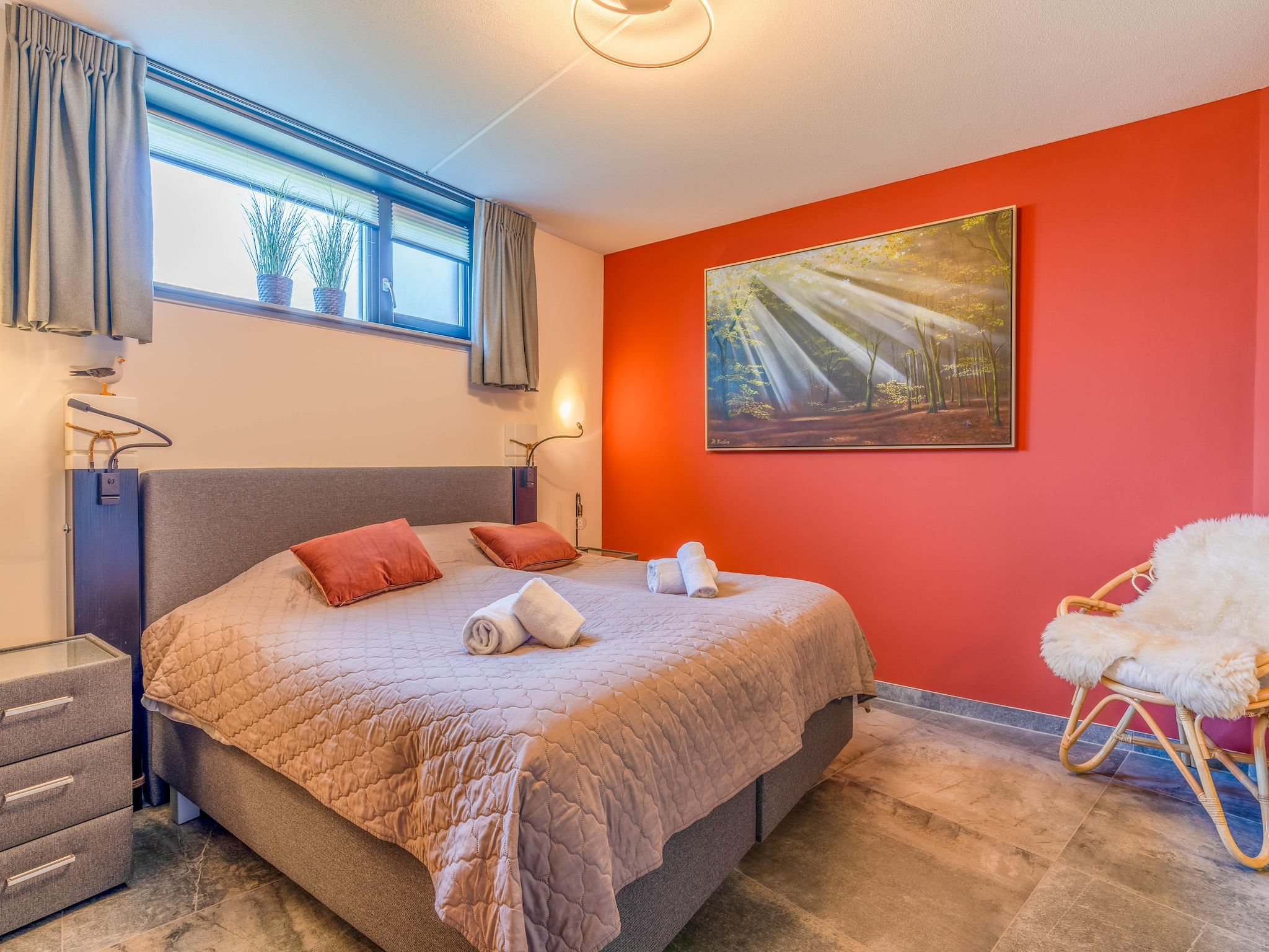 Een slaapkamer van Waalerburght 18 in De Waal