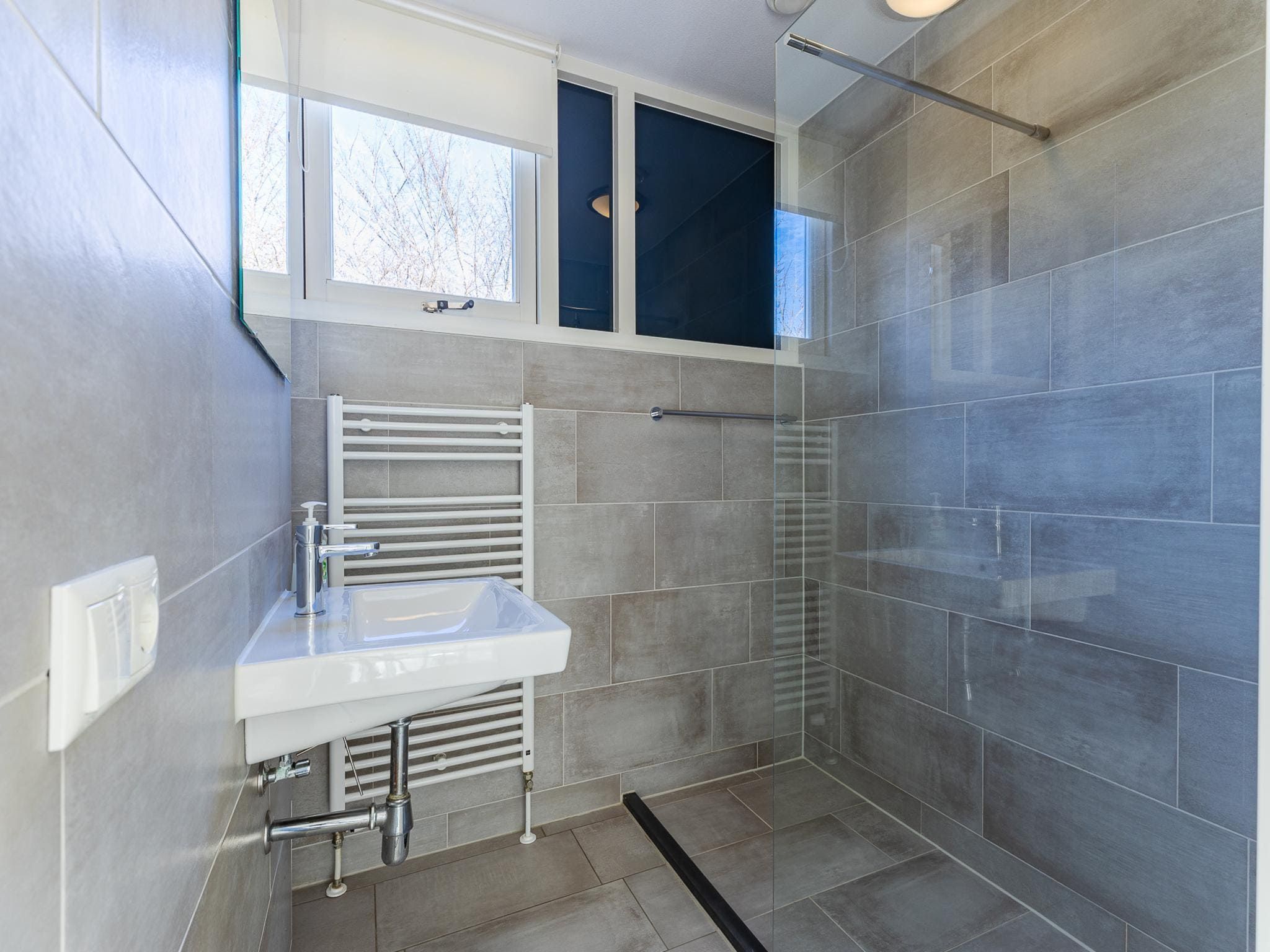 De badkamer van Zonnedorp 4 Villa Jula Renesse | Comfortable beach villa for 6 People in Renesse