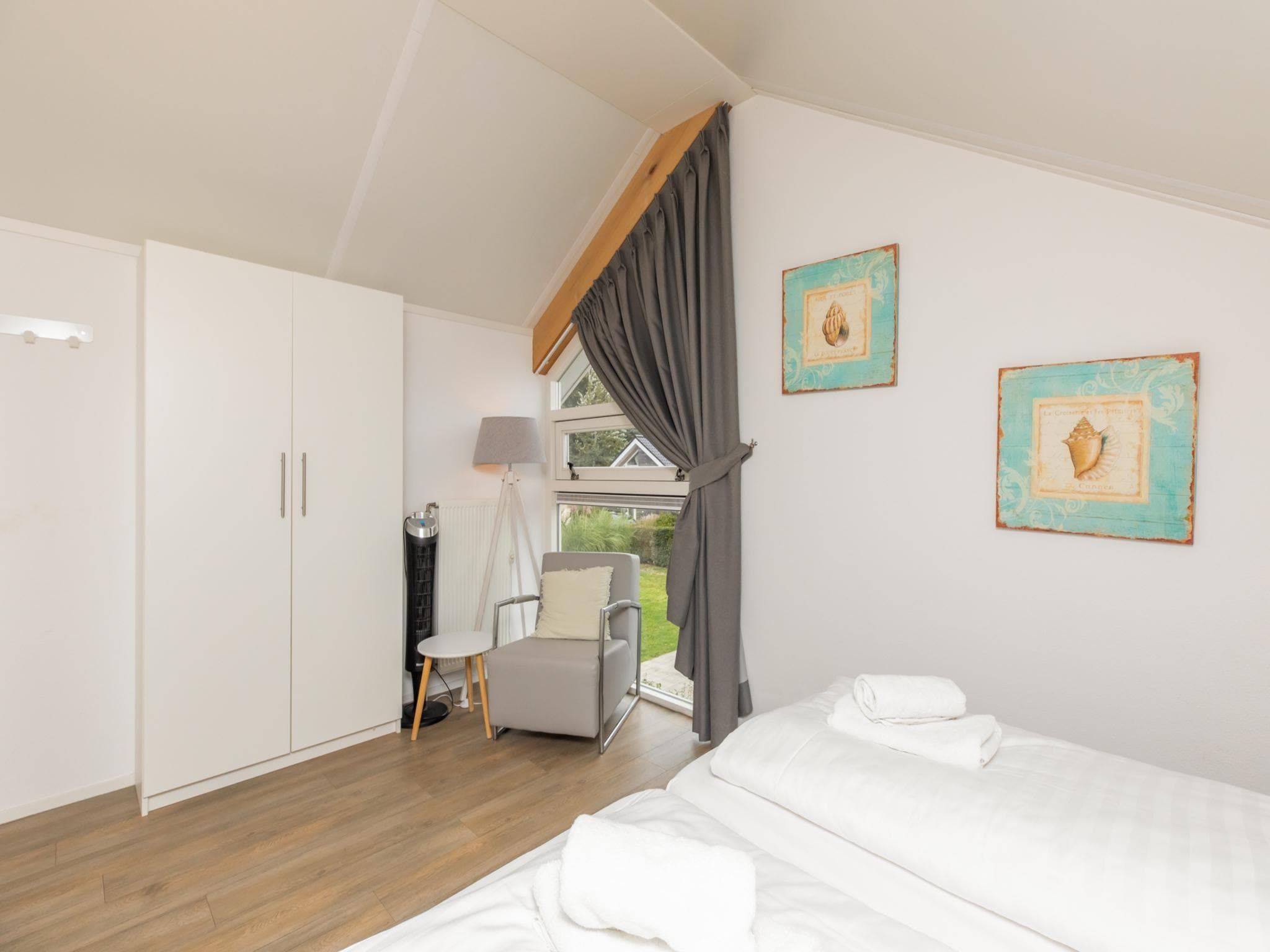 Een slaapkamer van Zonnedorp 18 Duinhuis Renesse | Relaxed beach holiday for the whole family in Renesse