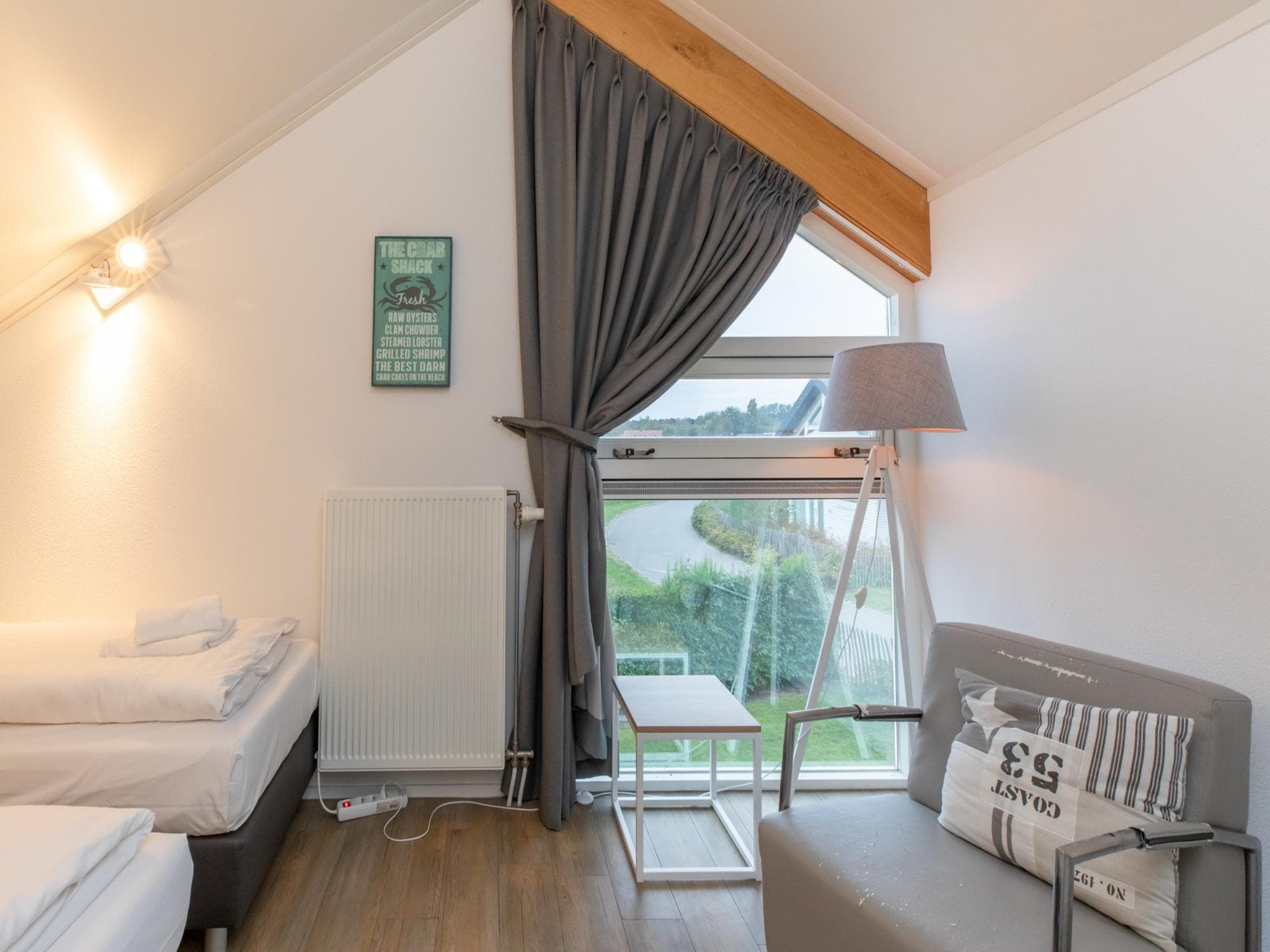 Een slaapkamer van Zonnedorp 18 Duinhuis Renesse | Relaxed beach holiday for the whole family in Renesse