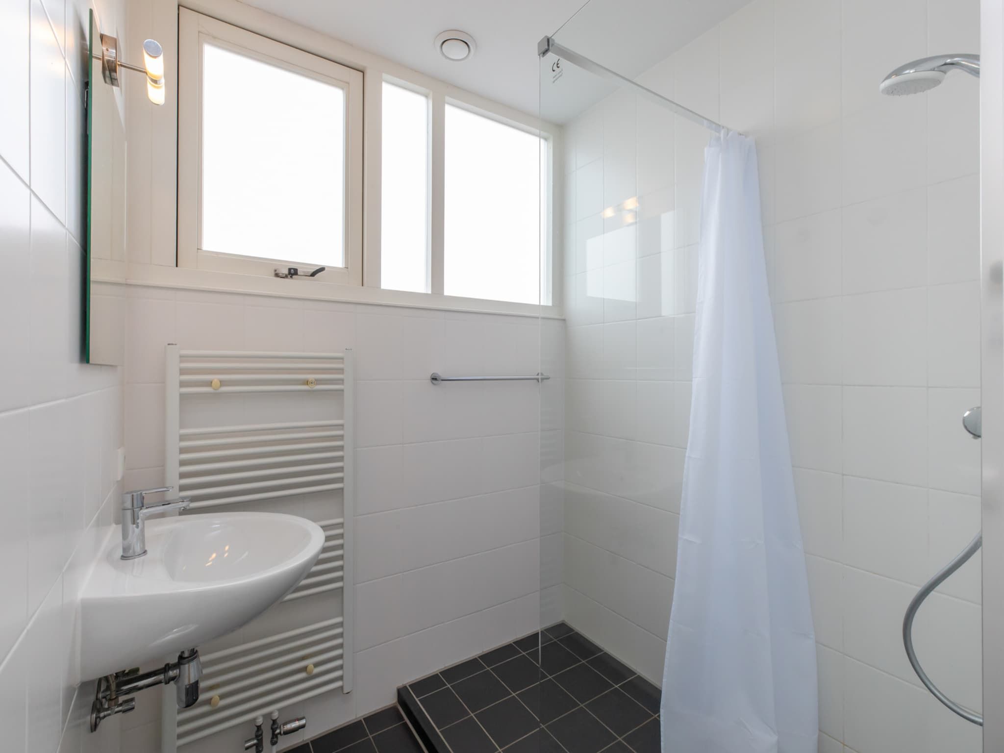 De badkamer van Zonnedorp 21  Beach Villa Joya Renesse | Luxury Beach Villa with Sauna in Renesse