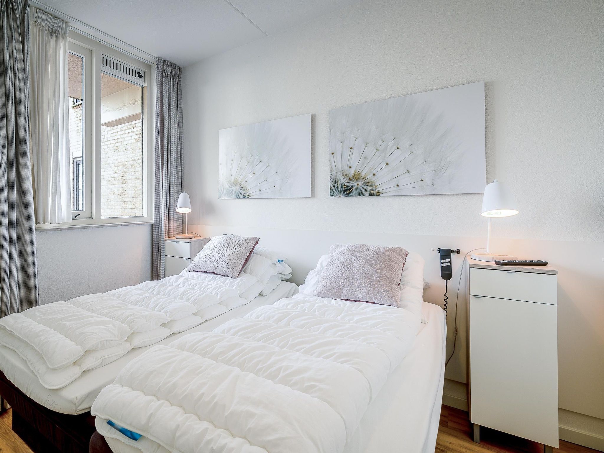 Een slaapkamer van Juliana 042 in De Koog