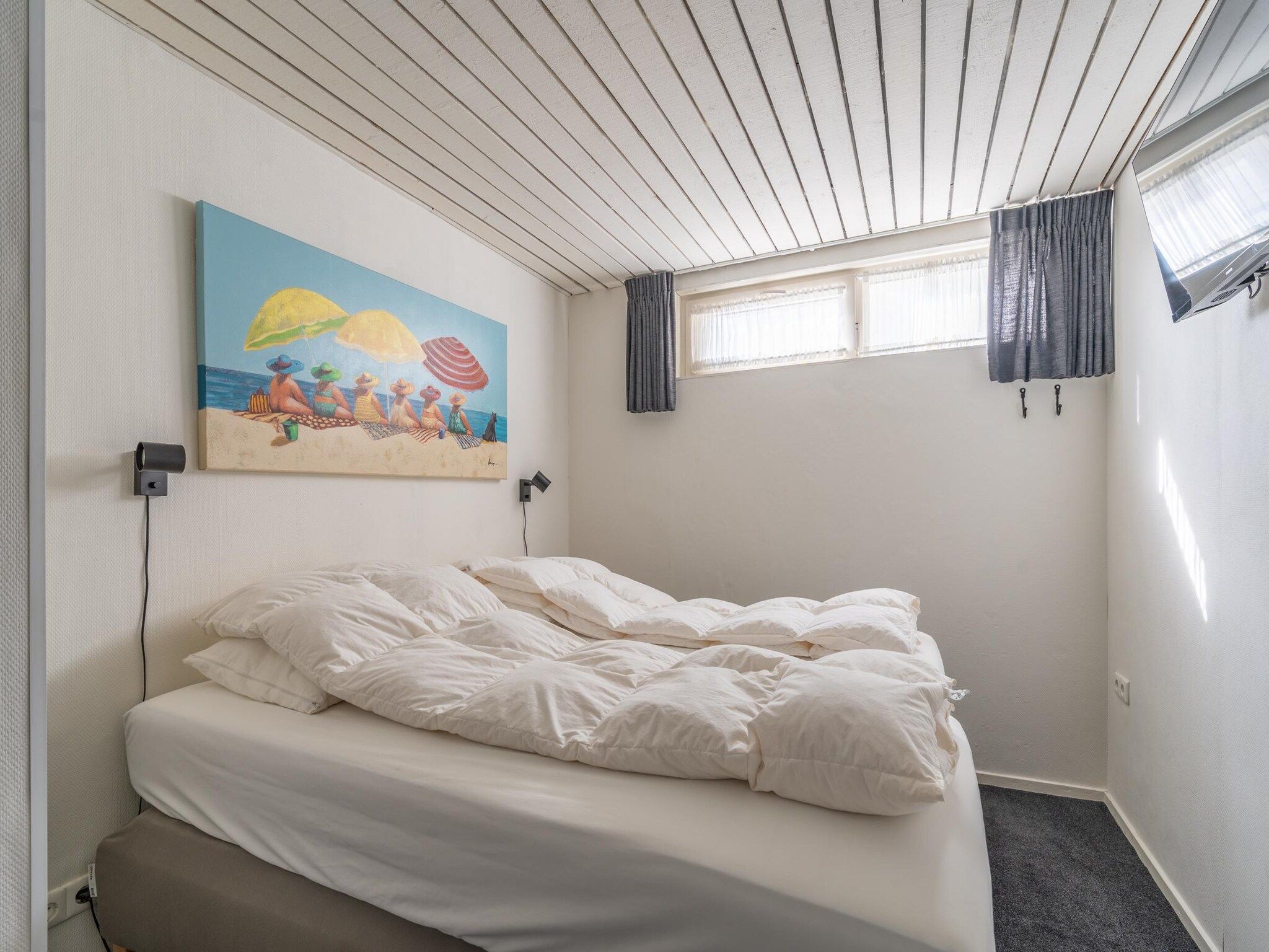 Een slaapkamer van De Anna 220 - Zand in De Koog