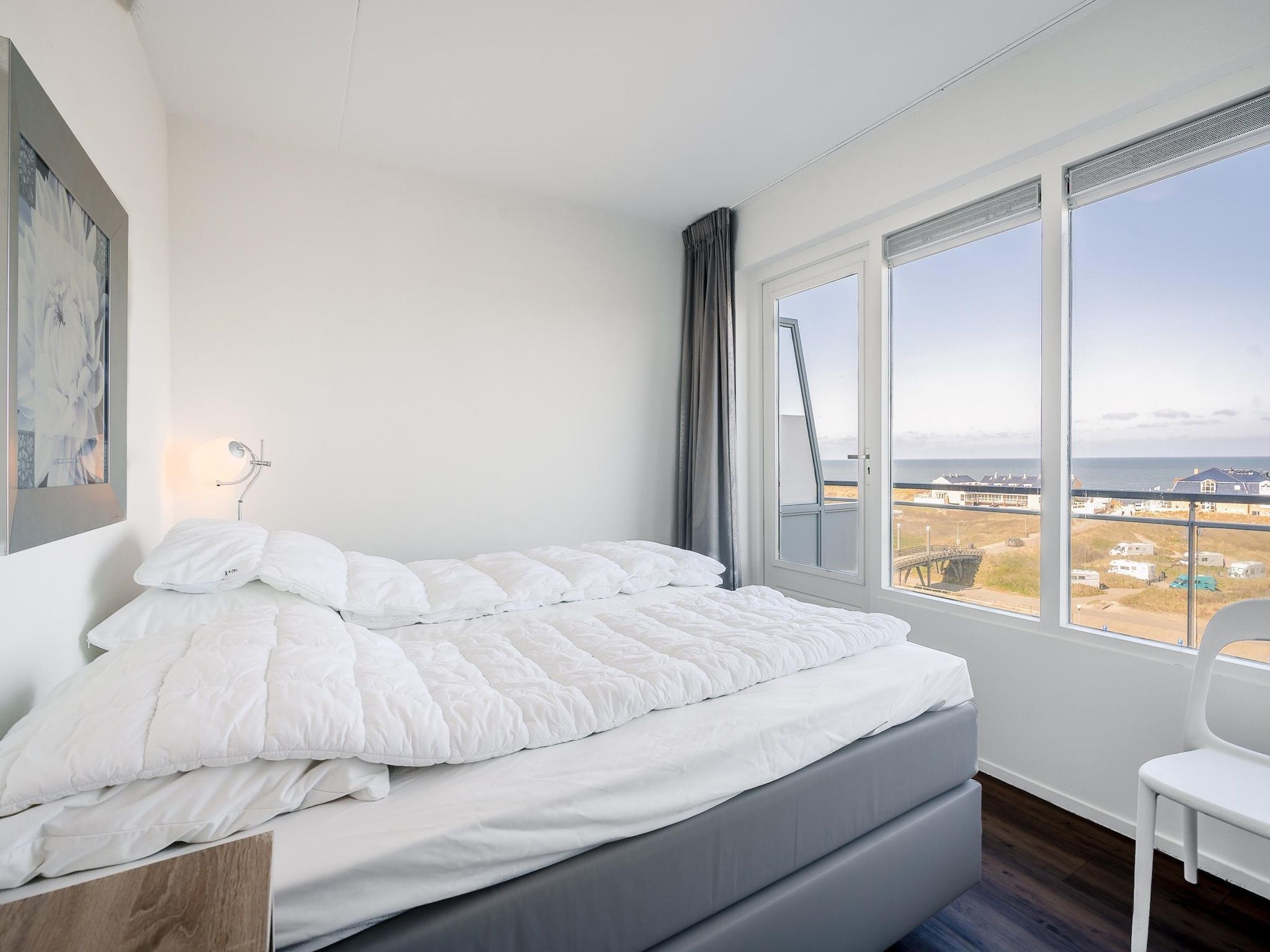 Een slaapkamer van Juliana 154 in De Koog