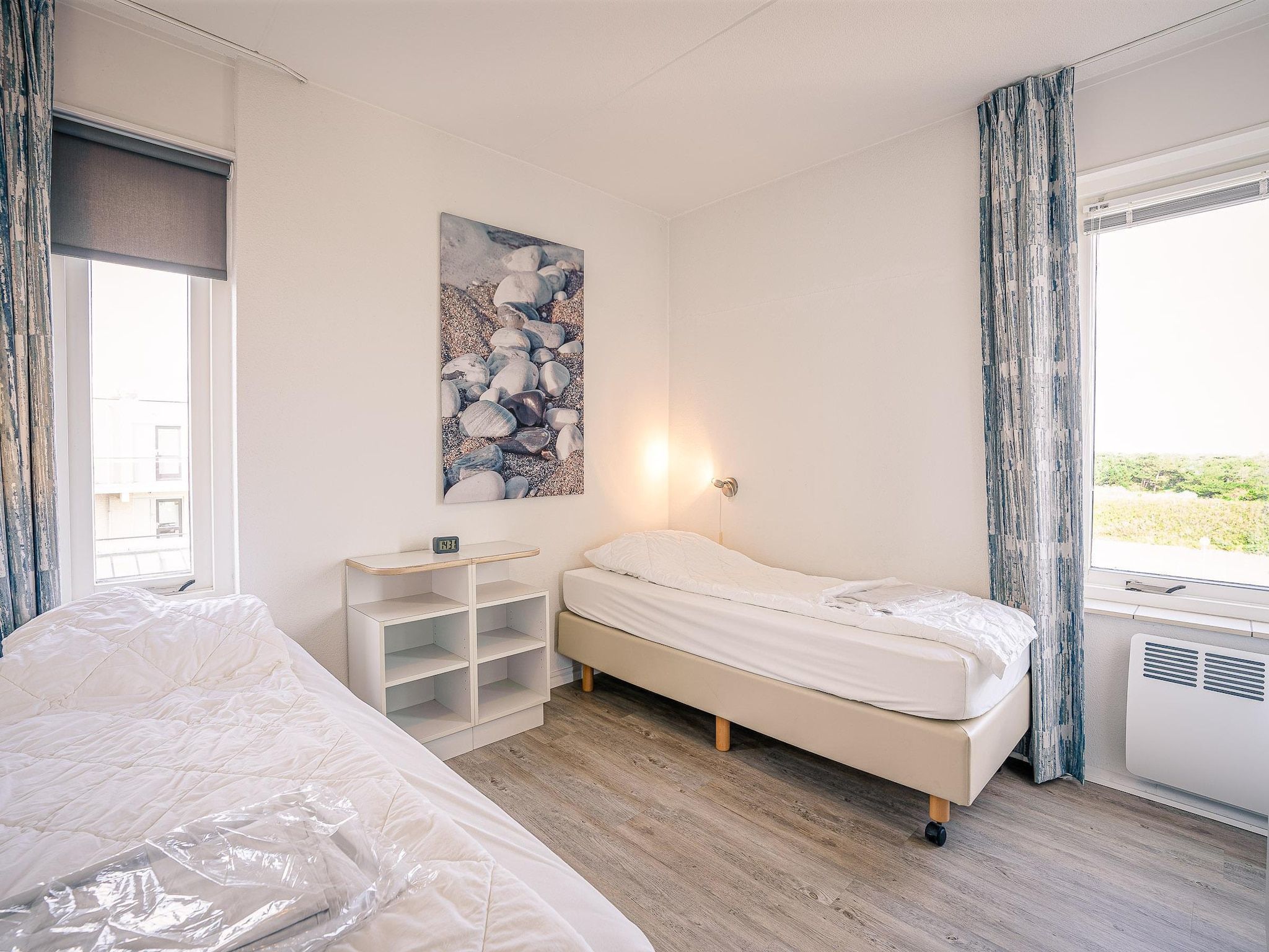 Een slaapkamer van Juliana 132 in De Koog