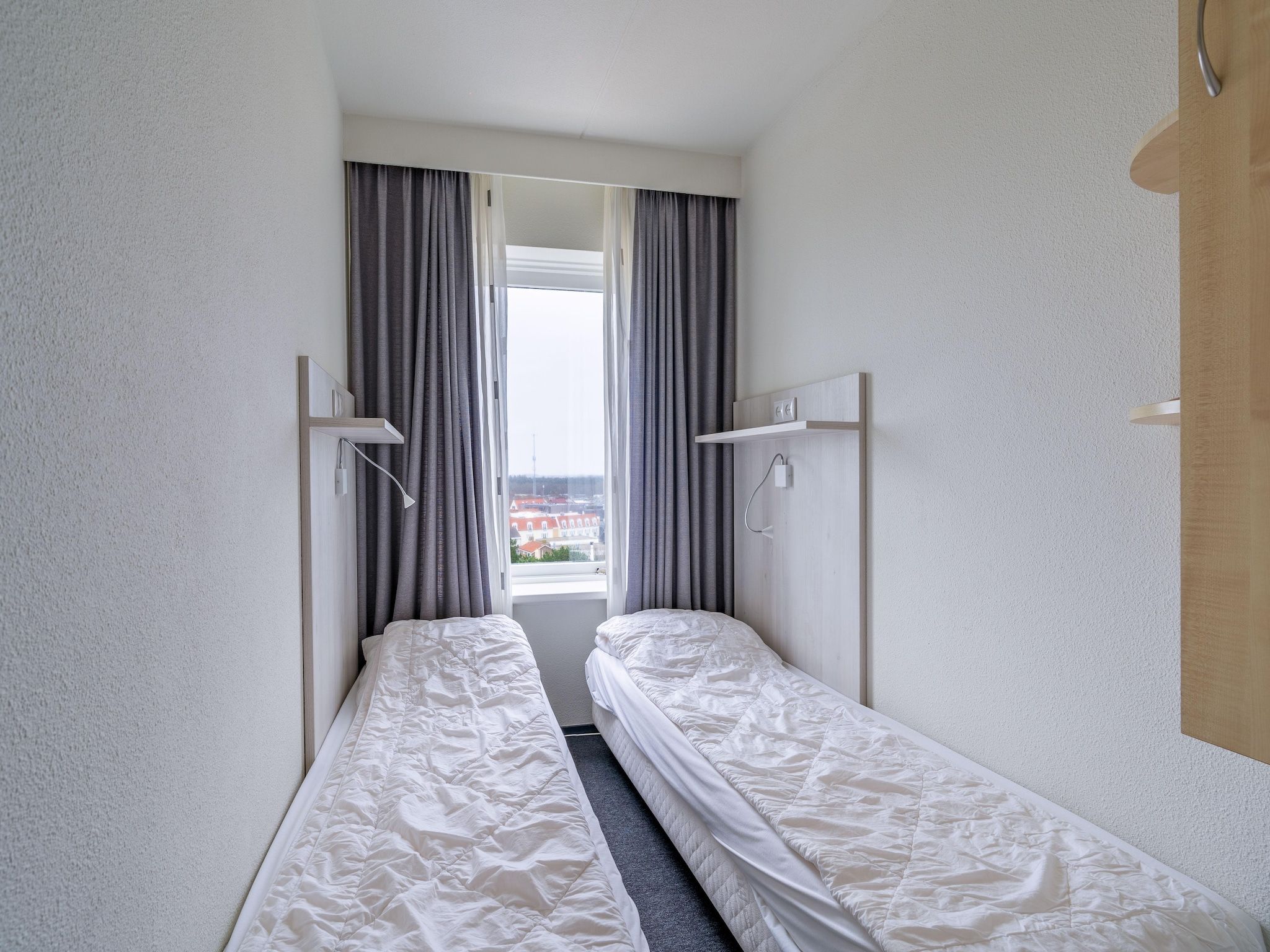 Een slaapkamer van Juliana 134 in De Koog