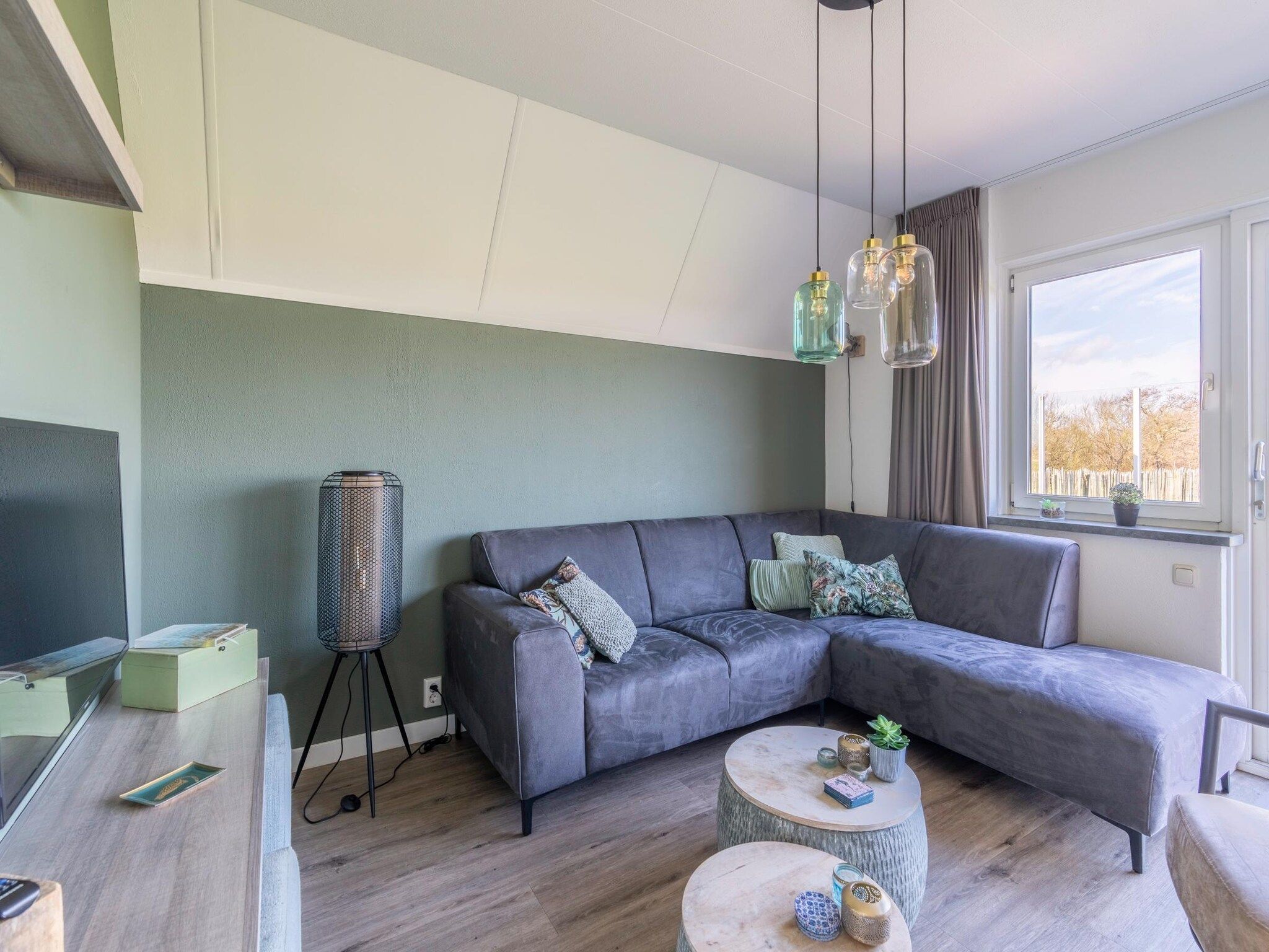 De woonkamer van Nieuwlanderweg 75 in De Waal