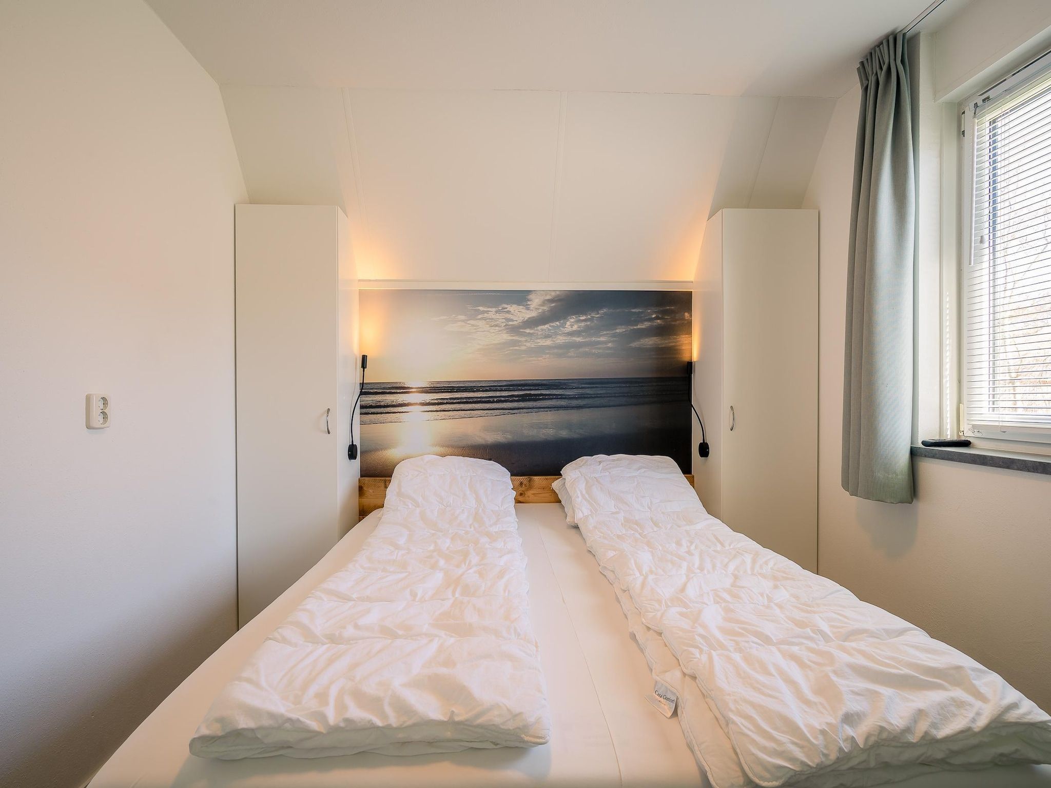 Een slaapkamer van Nieuwlanderweg 75 in De Waal