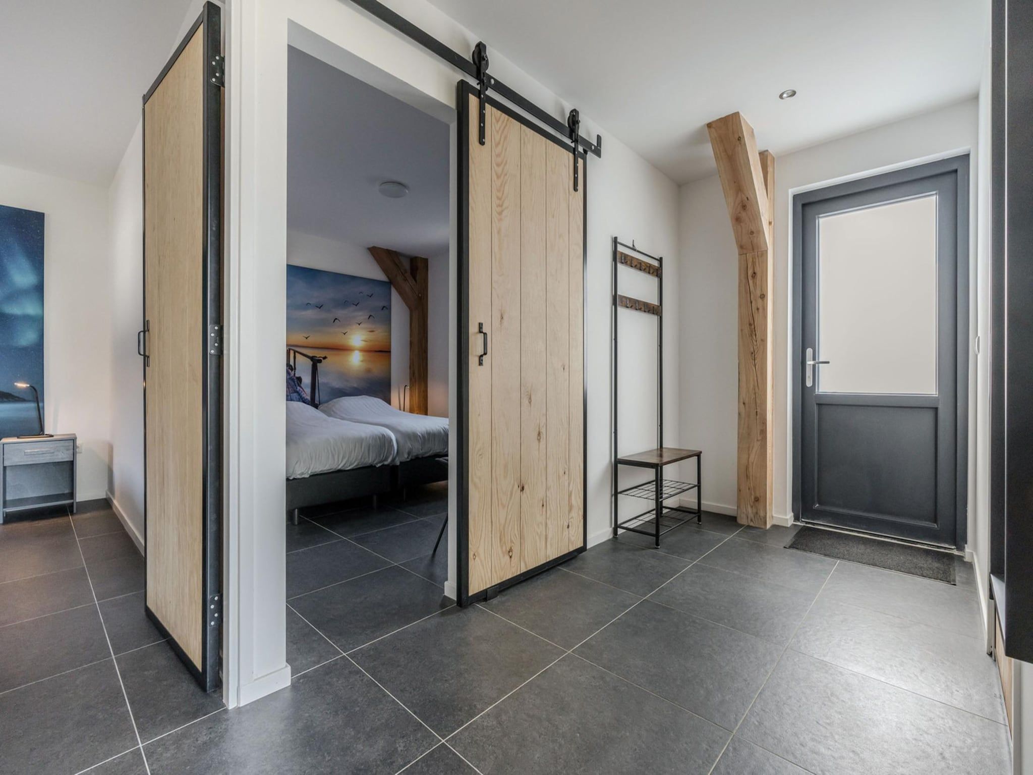 Een slaapkamer van Farm Lodge 669 in Baarle-nassau