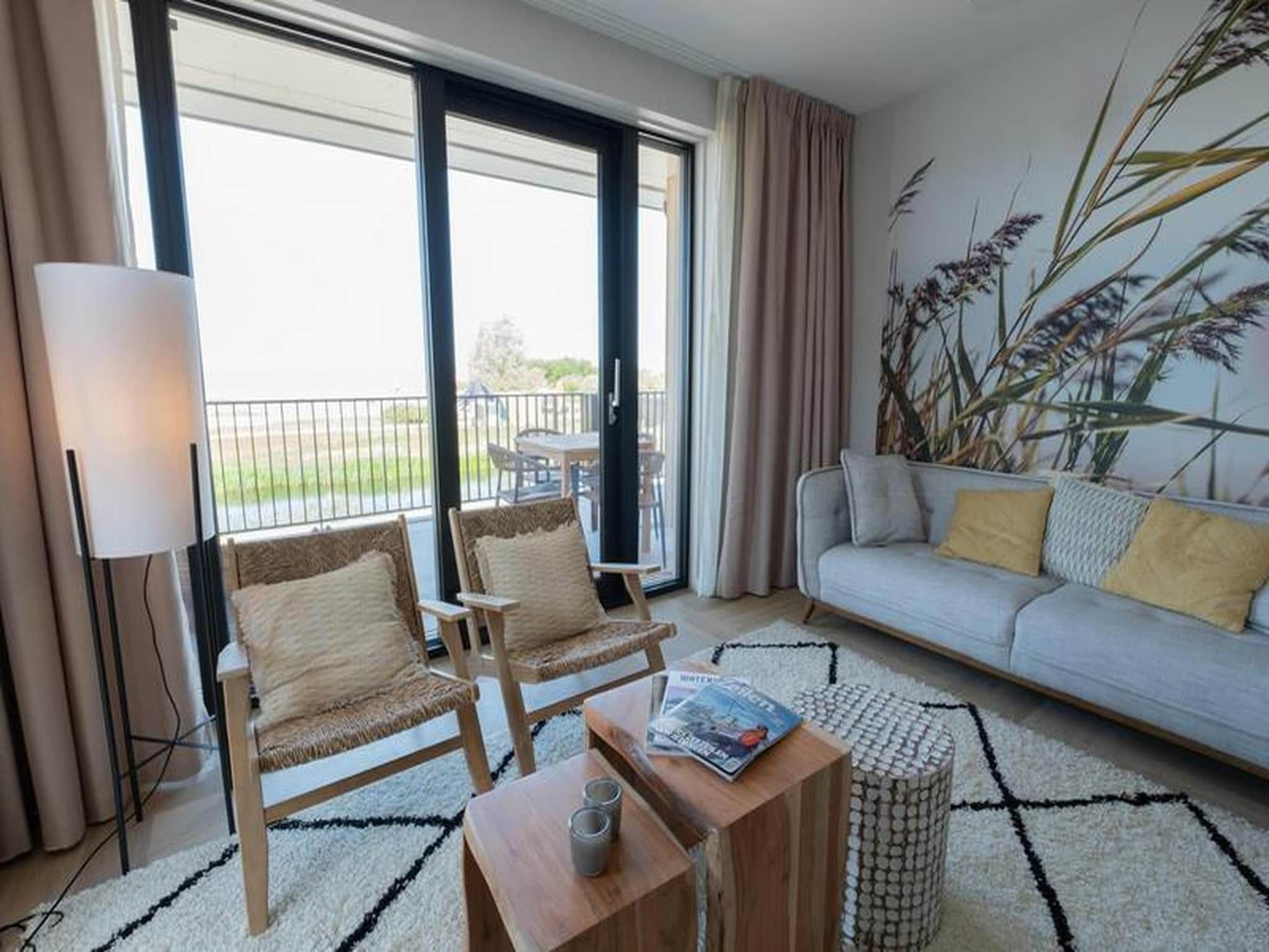 De woonkamer van Luxury Beach Apartment | 4 Pers. in Workum
