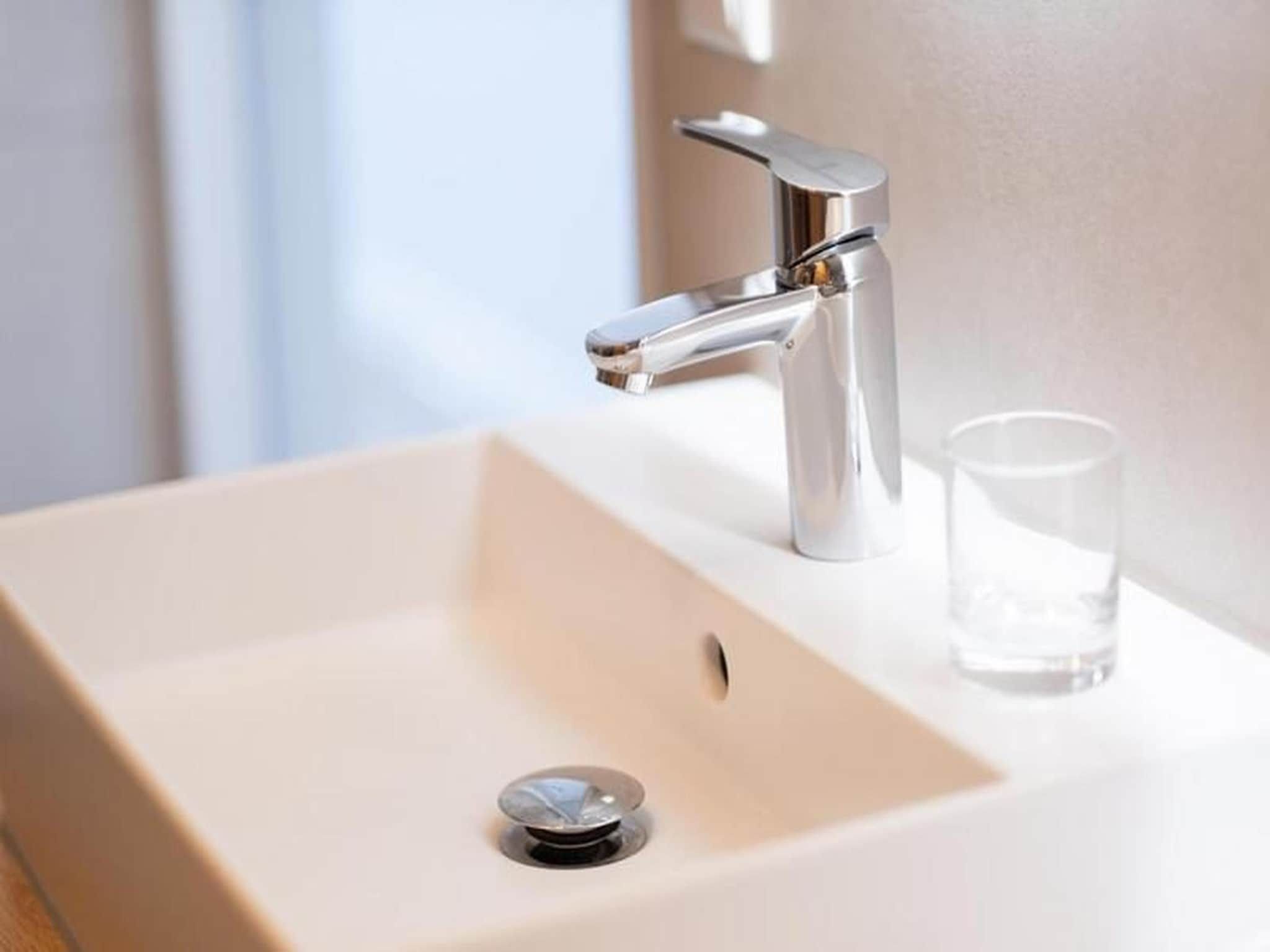 De badkamer van Luxury Beach Apartment | 4+2 Pers. in Workum
