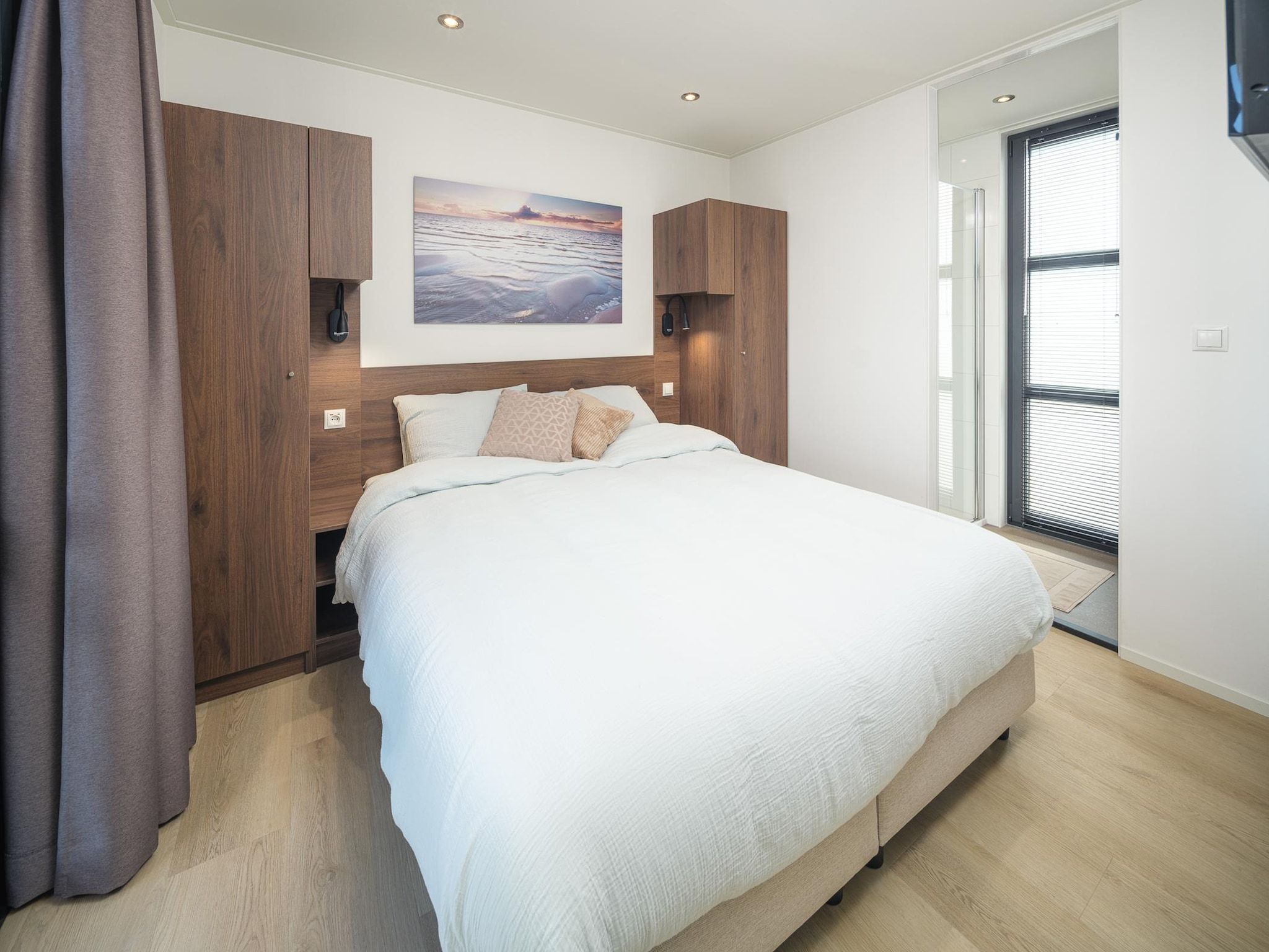 Een slaapkamer van Villa L-Meerzicht | 4 pers. in Workum