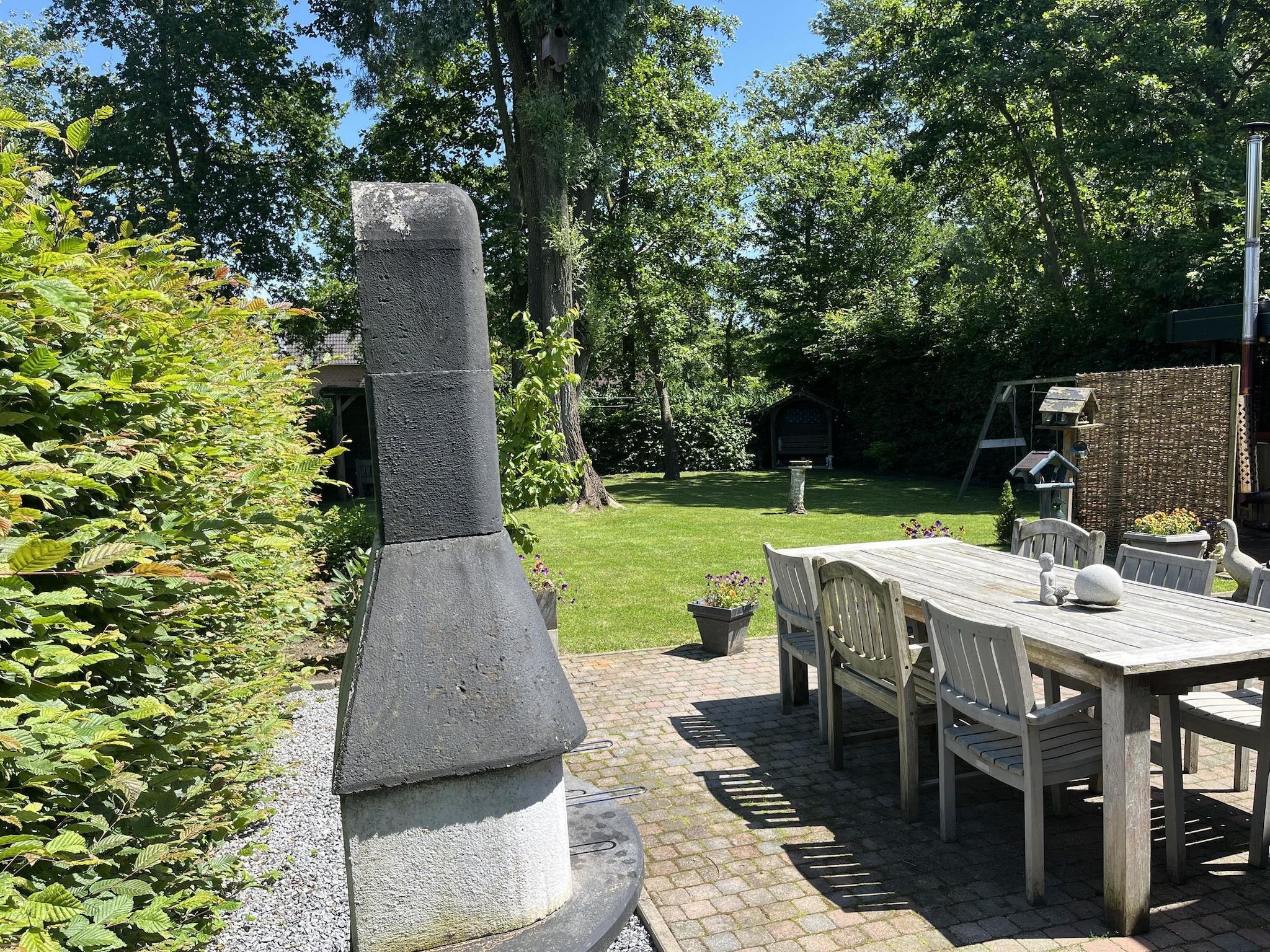 Het terras van 6 - Persons De Zingende Wilg in Ewijk