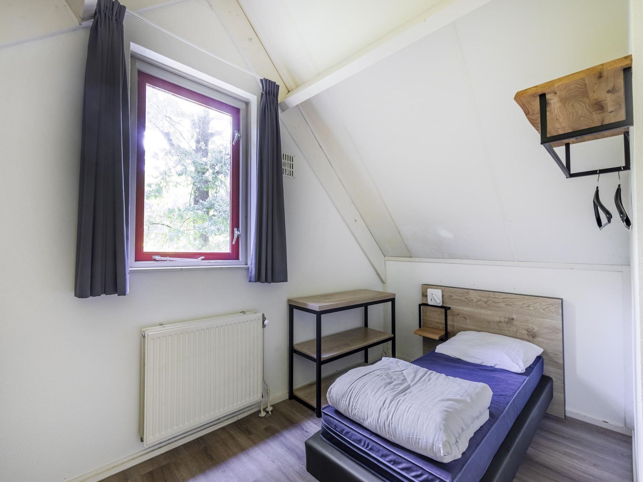 Een slaapkamer van 6 - Persons De Zingende Wilg (copy) (copy) in Ewijk