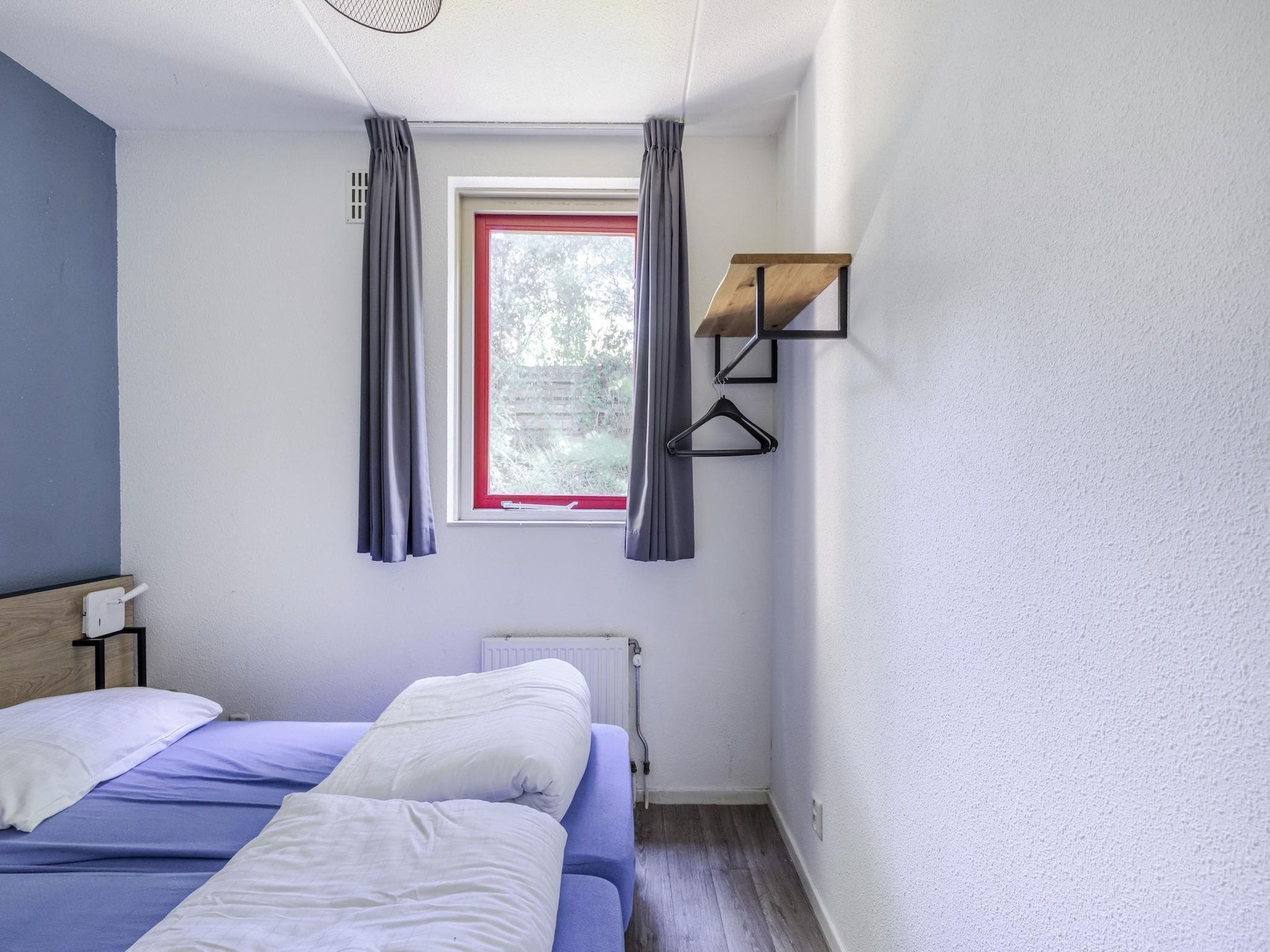 Een slaapkamer van 6 - Persons De Zingende Wilg (copy) (copy) in Ewijk