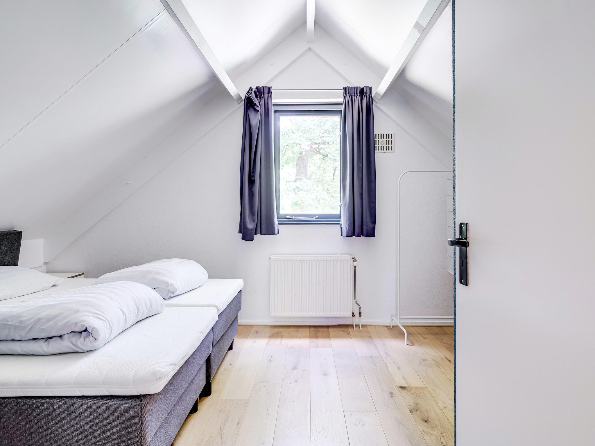 Een slaapkamer van 6 - Persons De Zingende Wilg (copy) (copy) (copy) in Ewijk