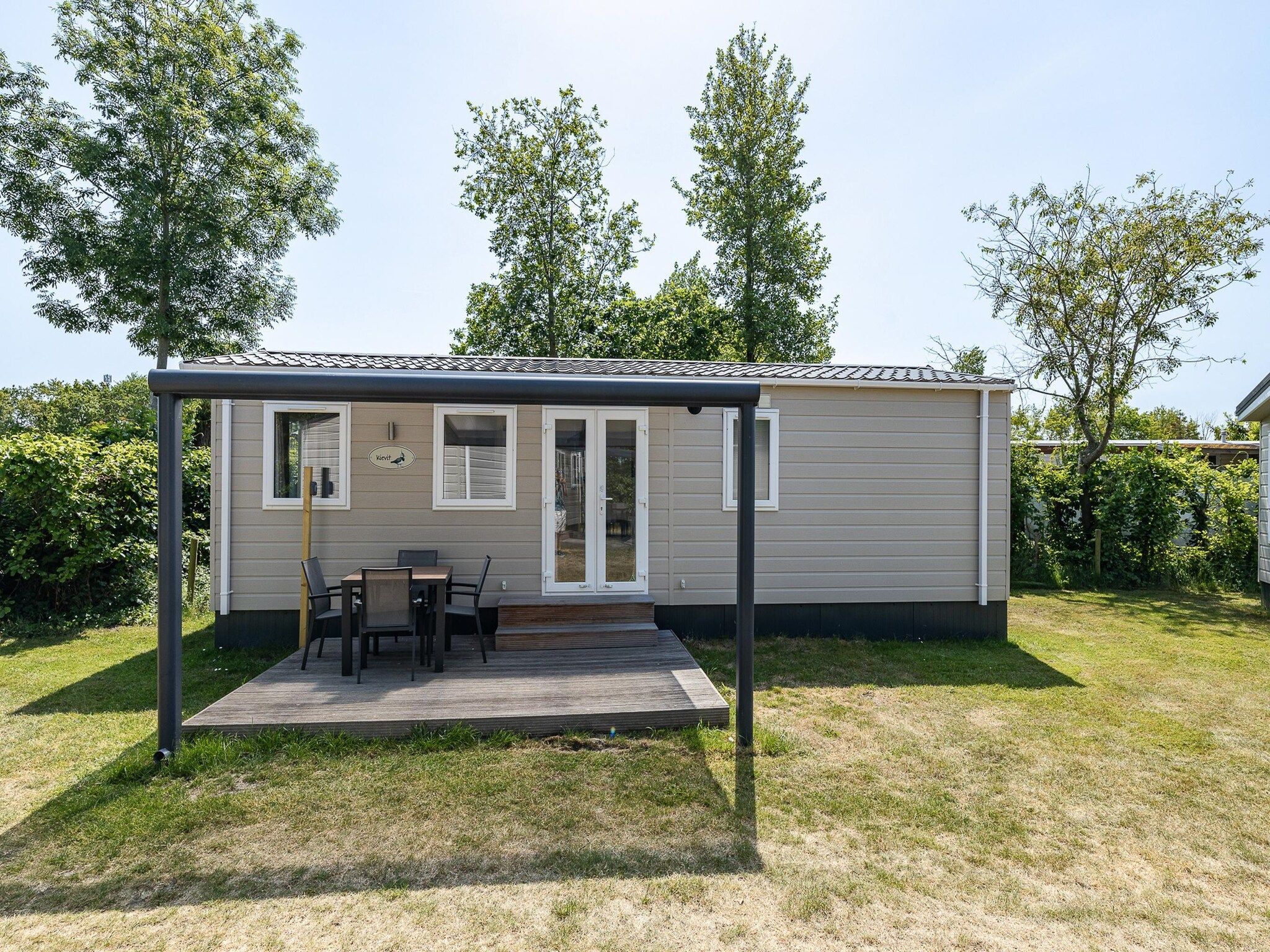 De buitenkant van Duinhoeve Chalet Vogel - Huisdier niet toegestaan in Burgh-Haamstede