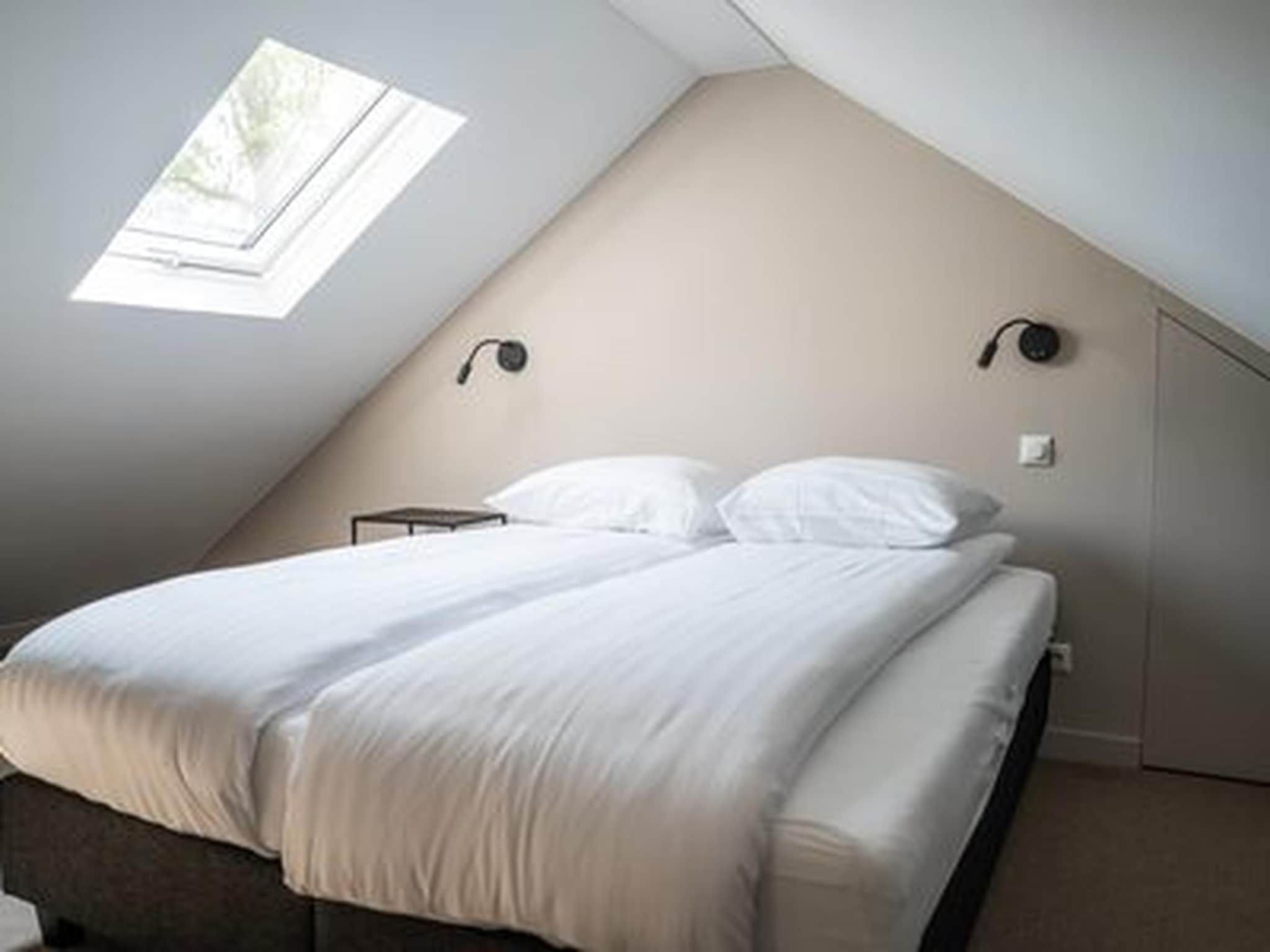 Een slaapkamer van Ecovilla Boszicht Luxe in Oirschot