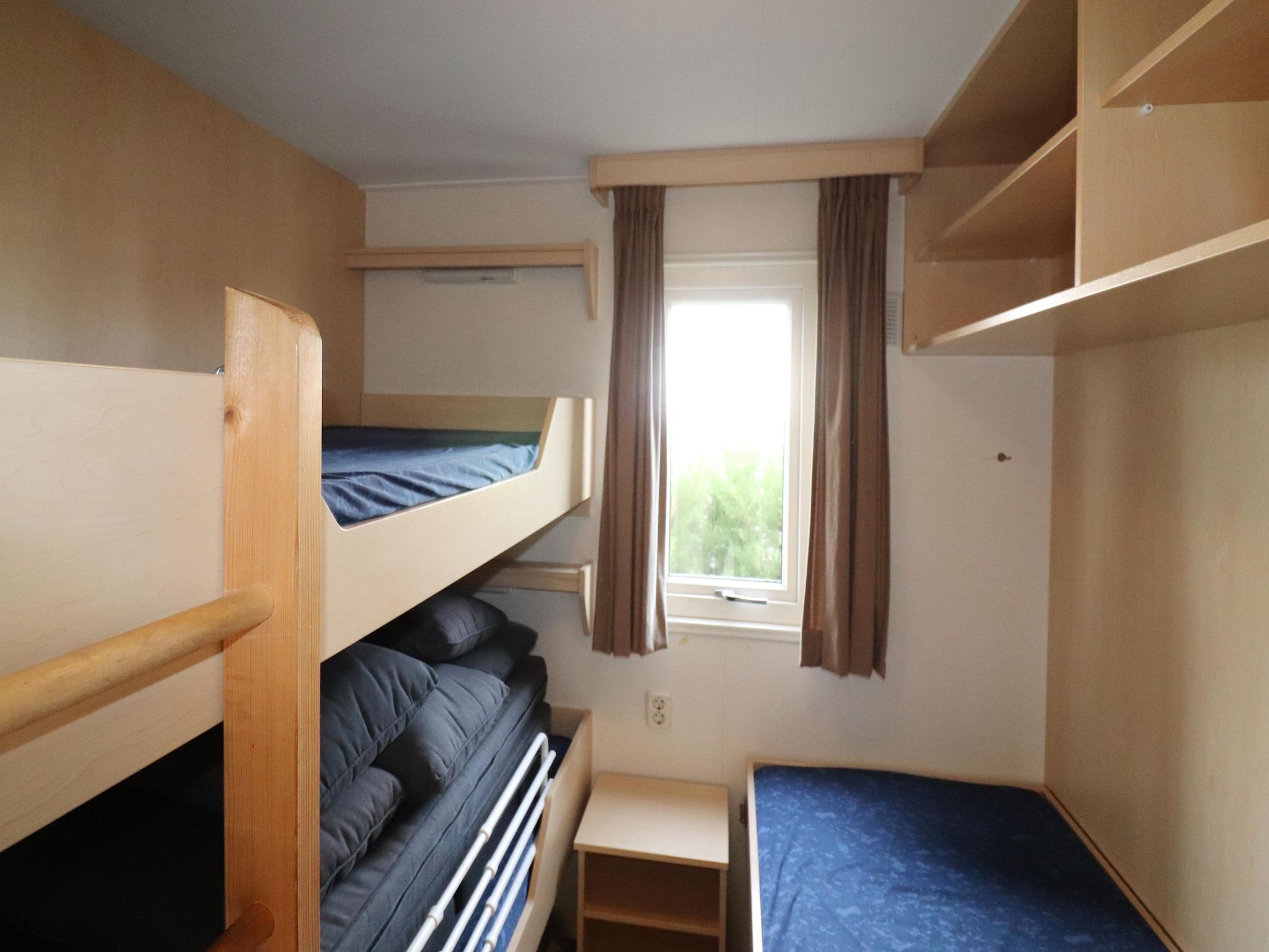 Een slaapkamer van Duinchalet Ameland in Hollum