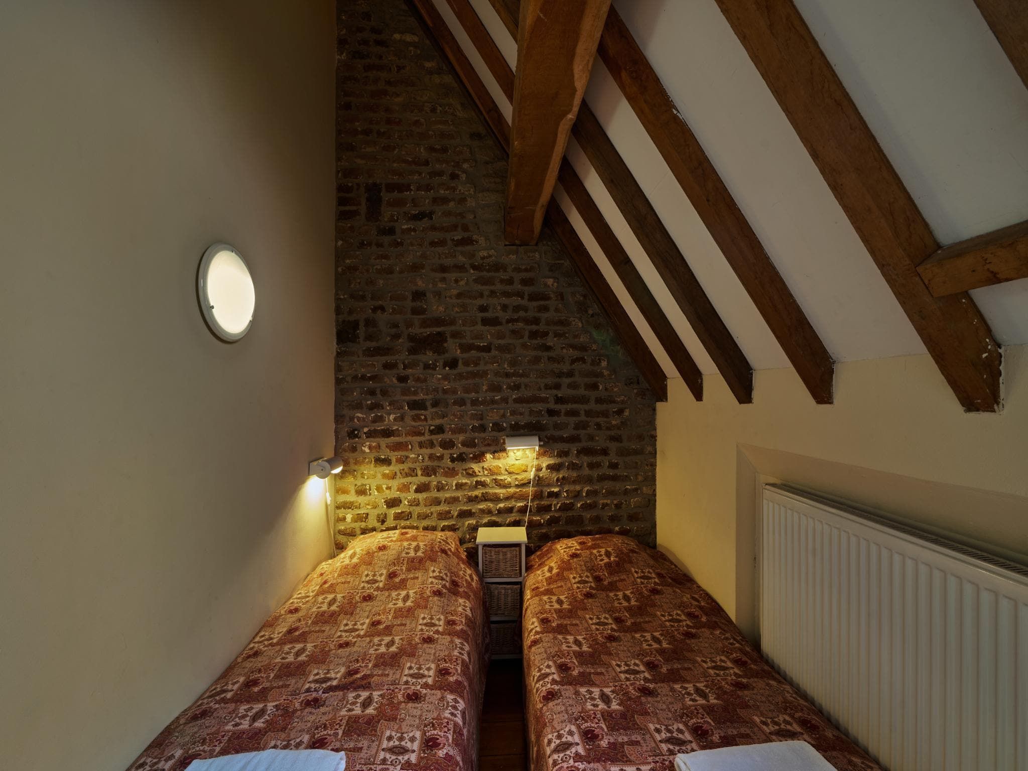 Een slaapkamer van Meschermolen 13 in Mesch-Eijsden