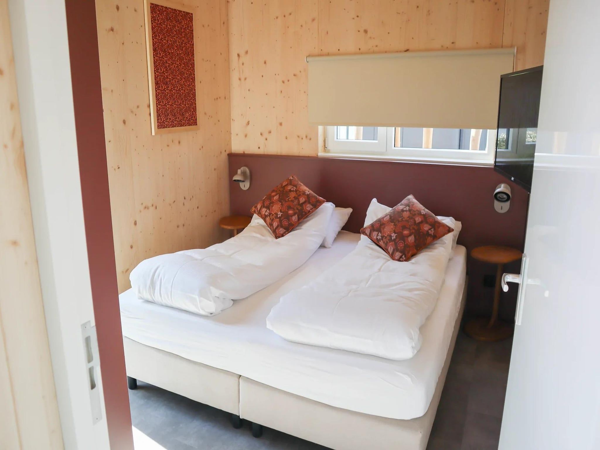 Een slaapkamer van Bungalow Ocean Deluxe 6 Person in ’s-Gravenzande