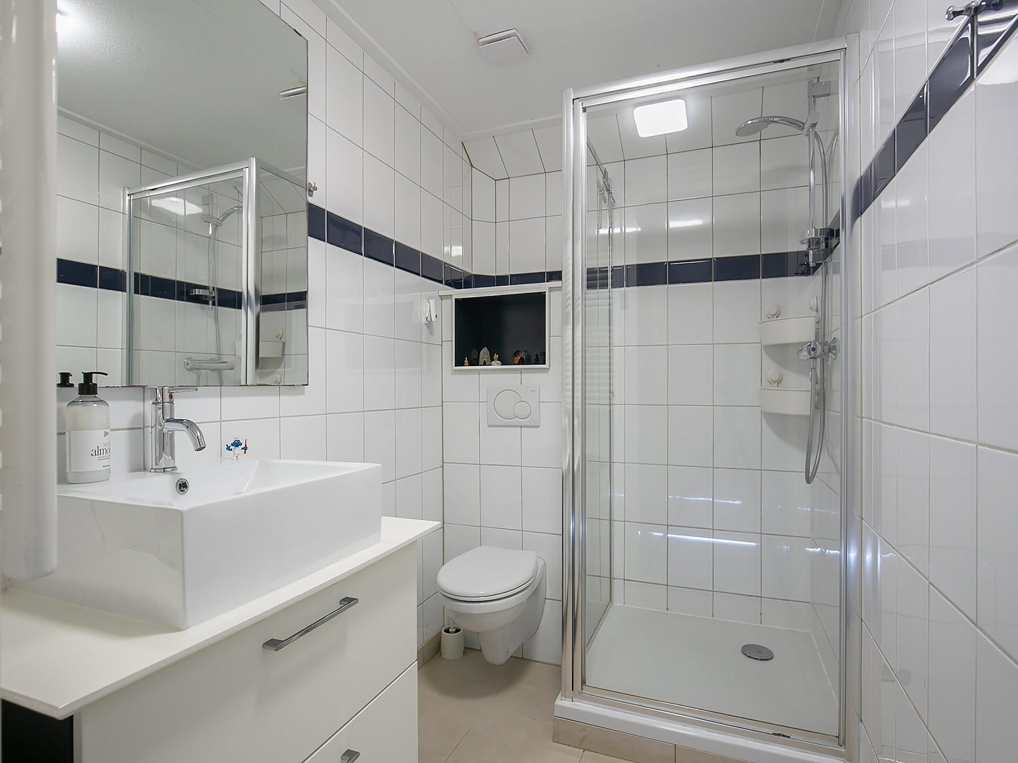 De badkamer van Combinatiewoningen Wolters in grou