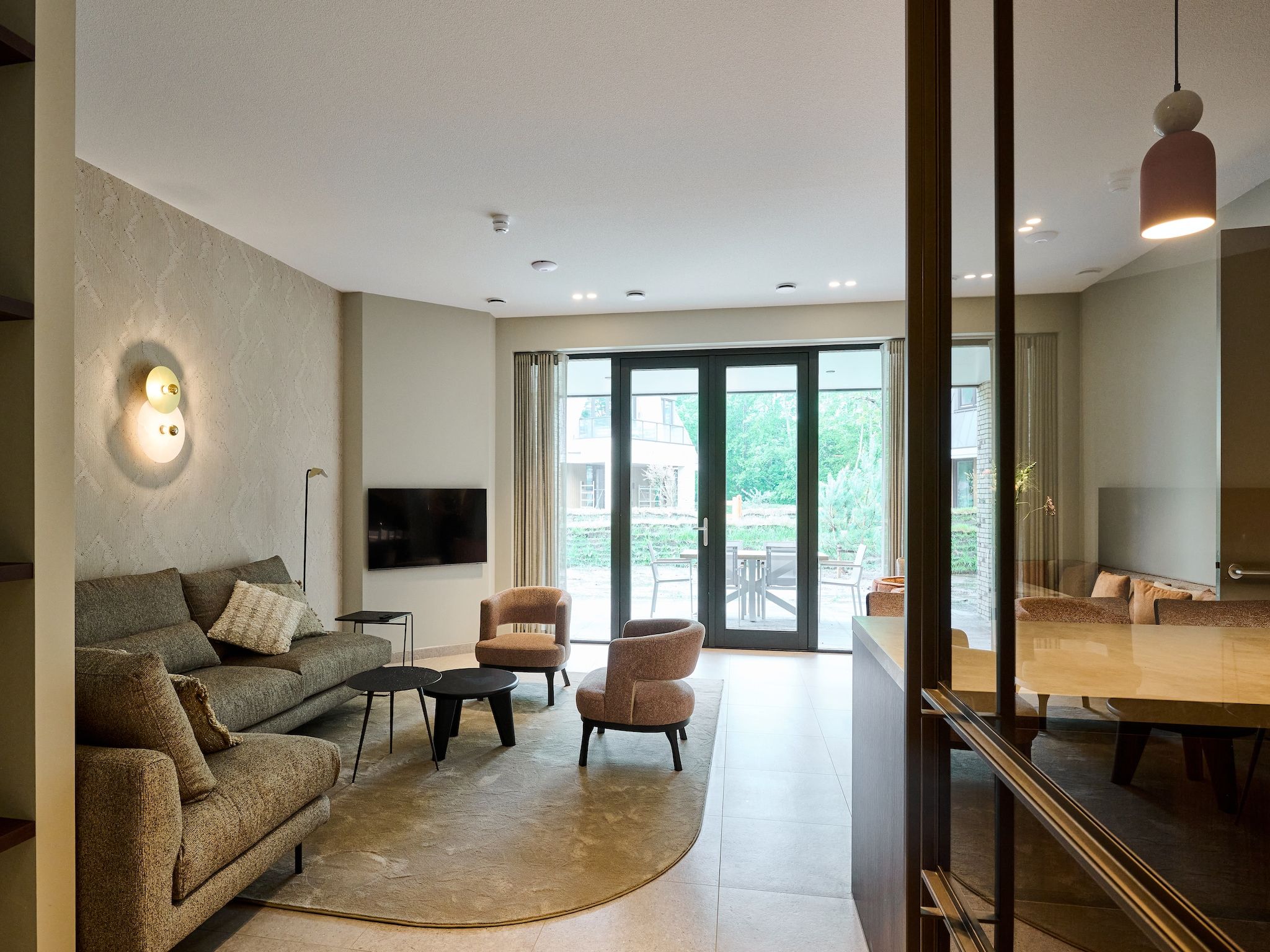 De woonkamer van Droomsuites Texel - 4 persoons appartement in Den Burg