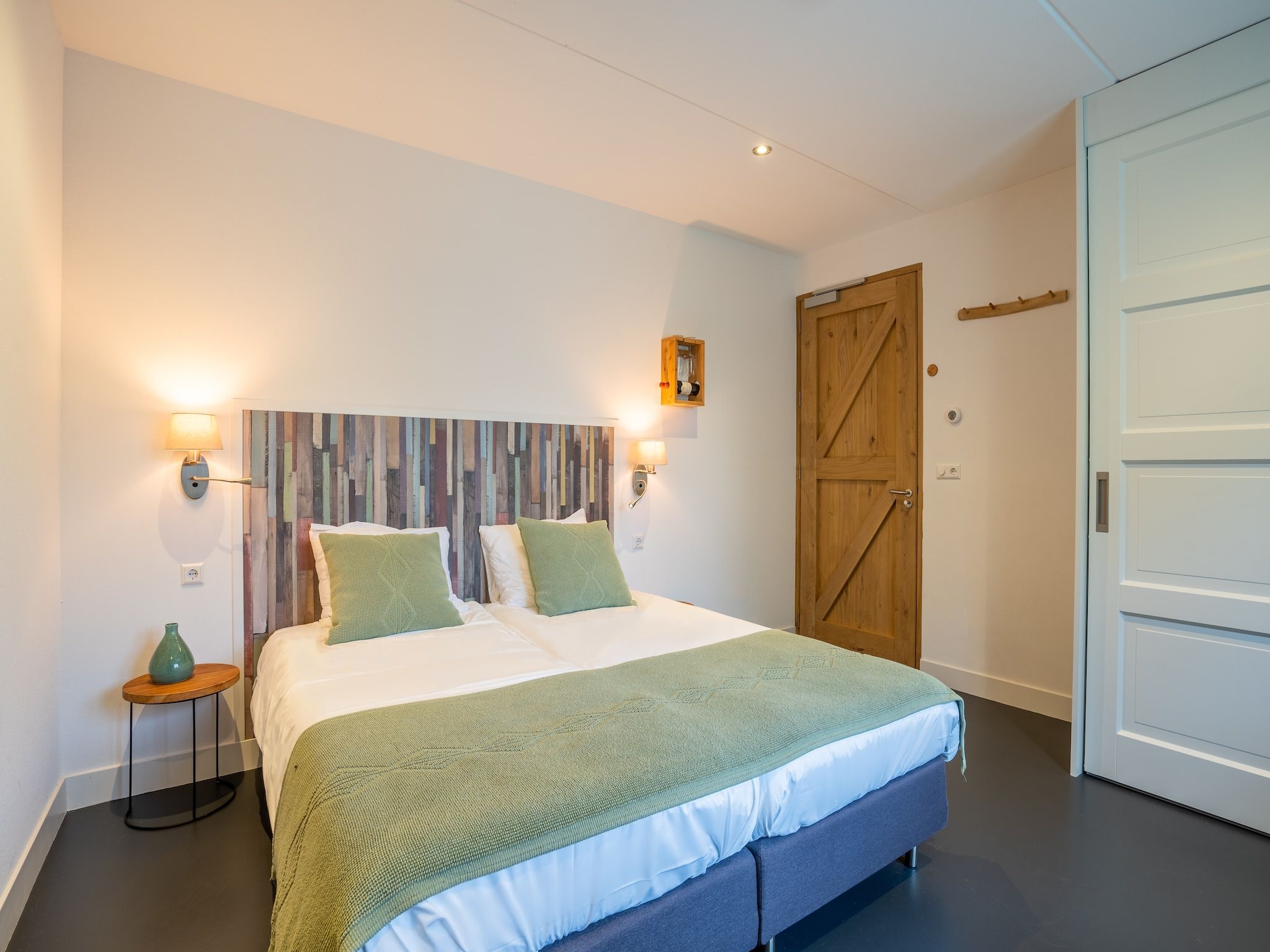 Een slaapkamer van Duynweelde Texel in Den Burg