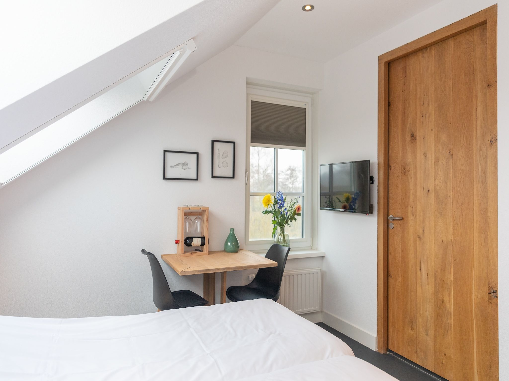 Een slaapkamer van Duynweelde Texel in Den Burg