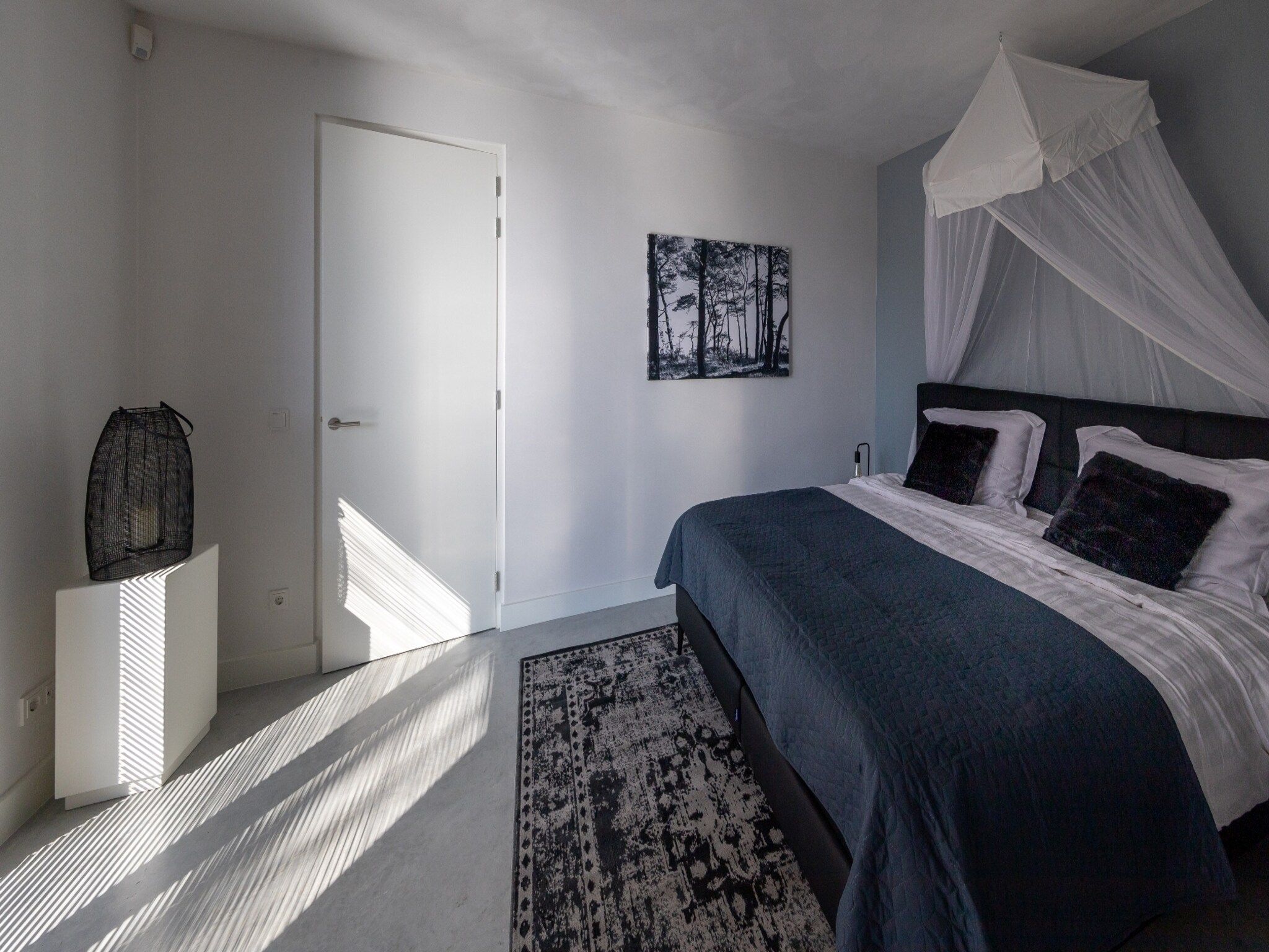 Een slaapkamer van Houten Boshuis in Oosterhout