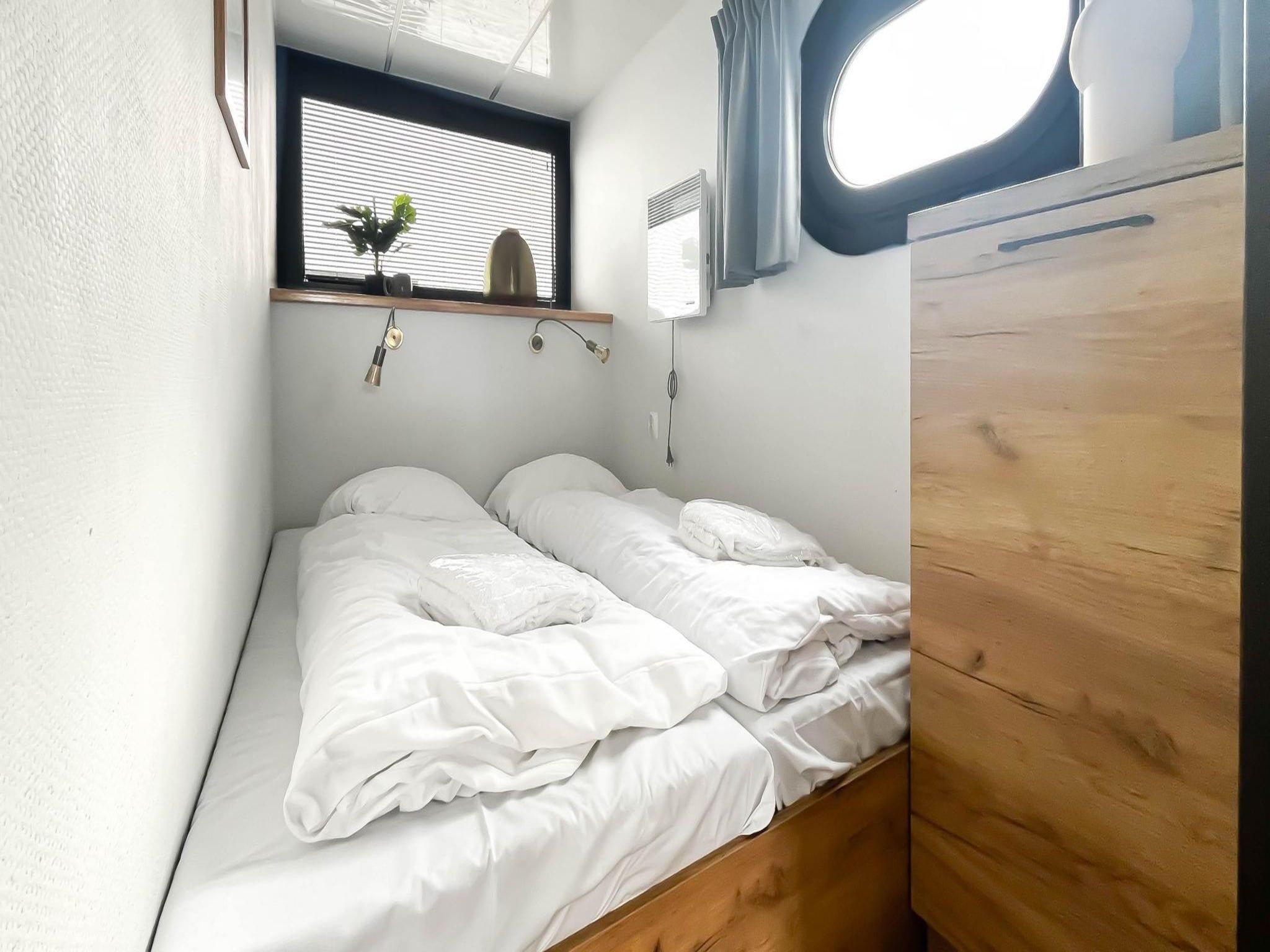 Een slaapkamer van Meerzicht in Uitgeest