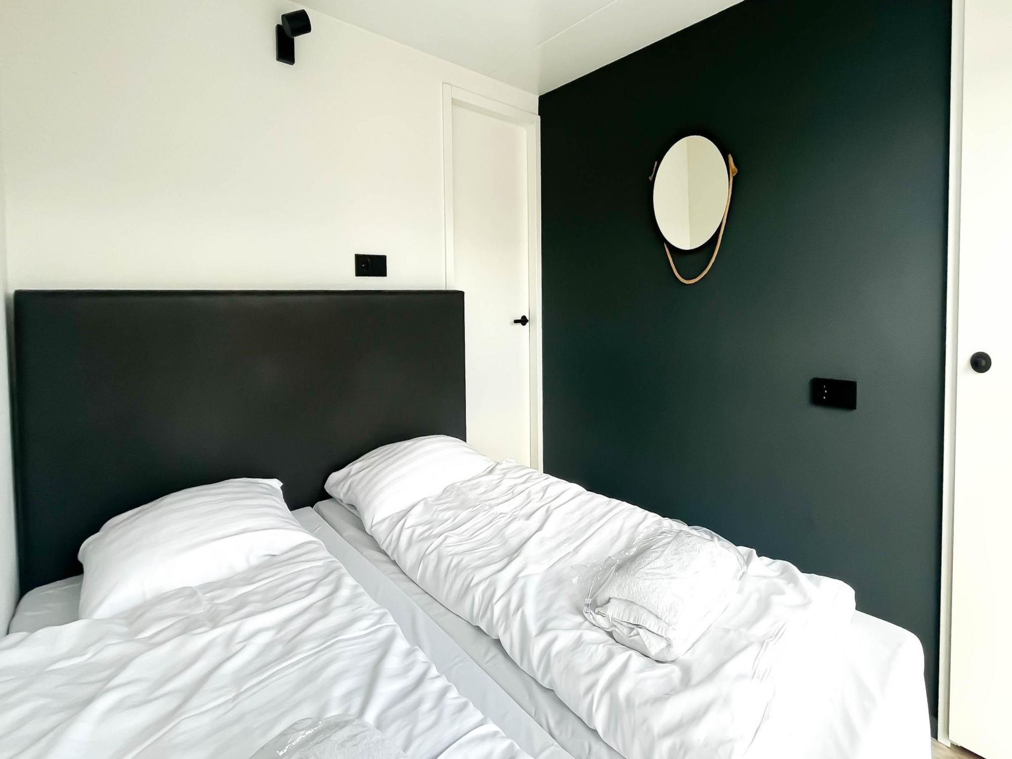 Een slaapkamer van Prachtzicht in Uitgeest