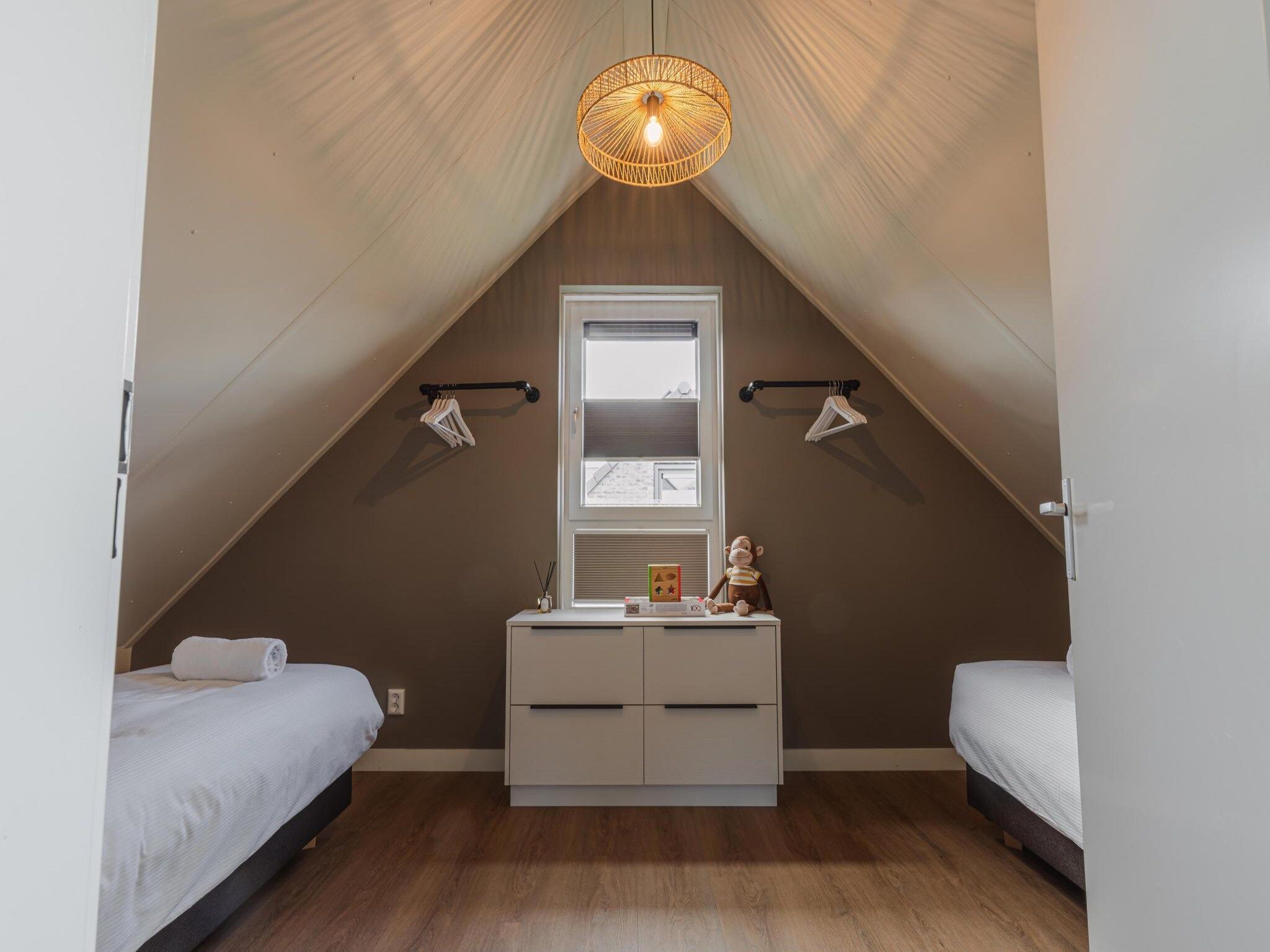 Een slaapkamer van Vakantiehuis Ultiem Genieten - 80 in Sint Maarten