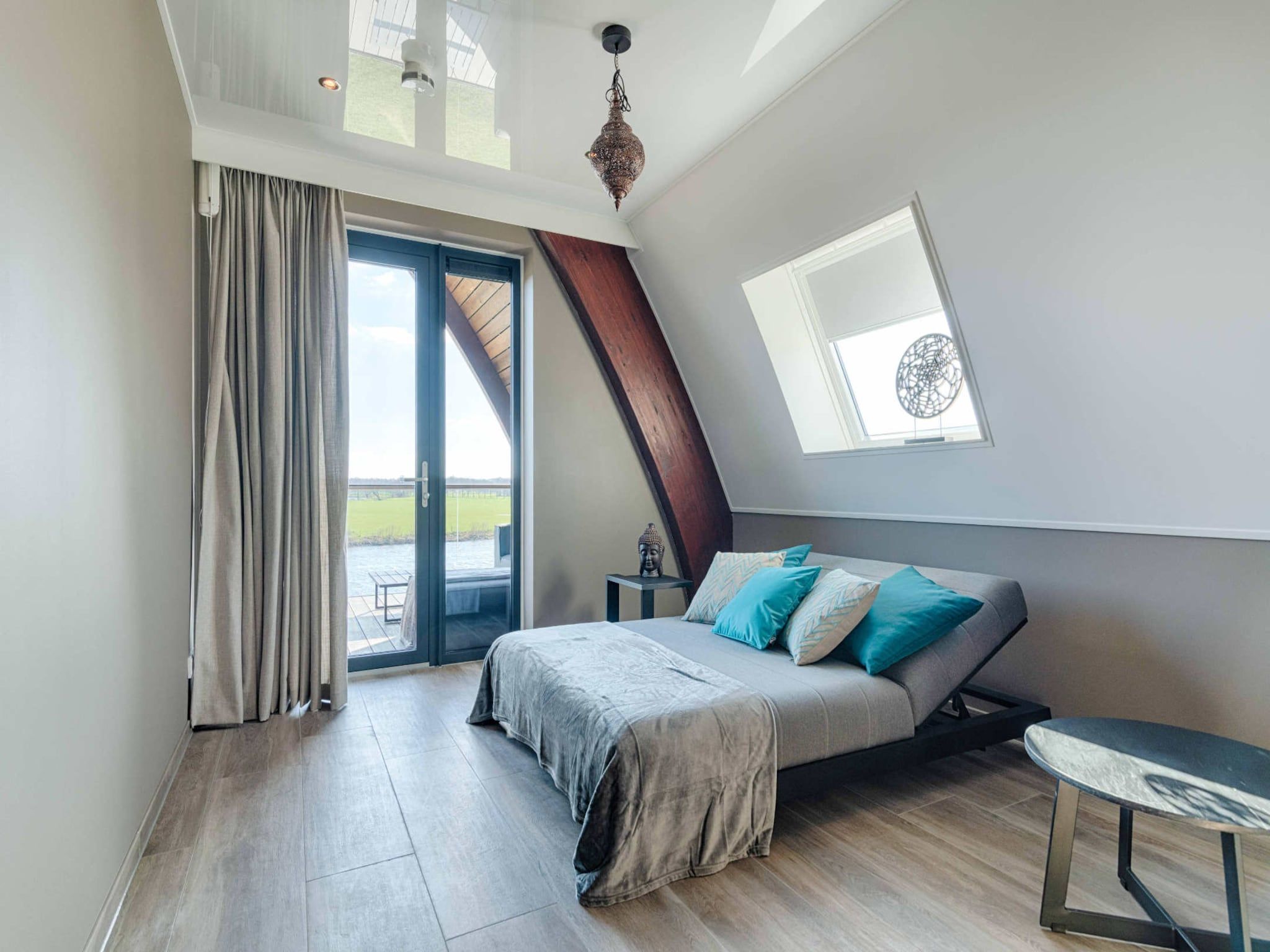 Een slaapkamer van Wellness at the Vecht - First floor in Dalfsen