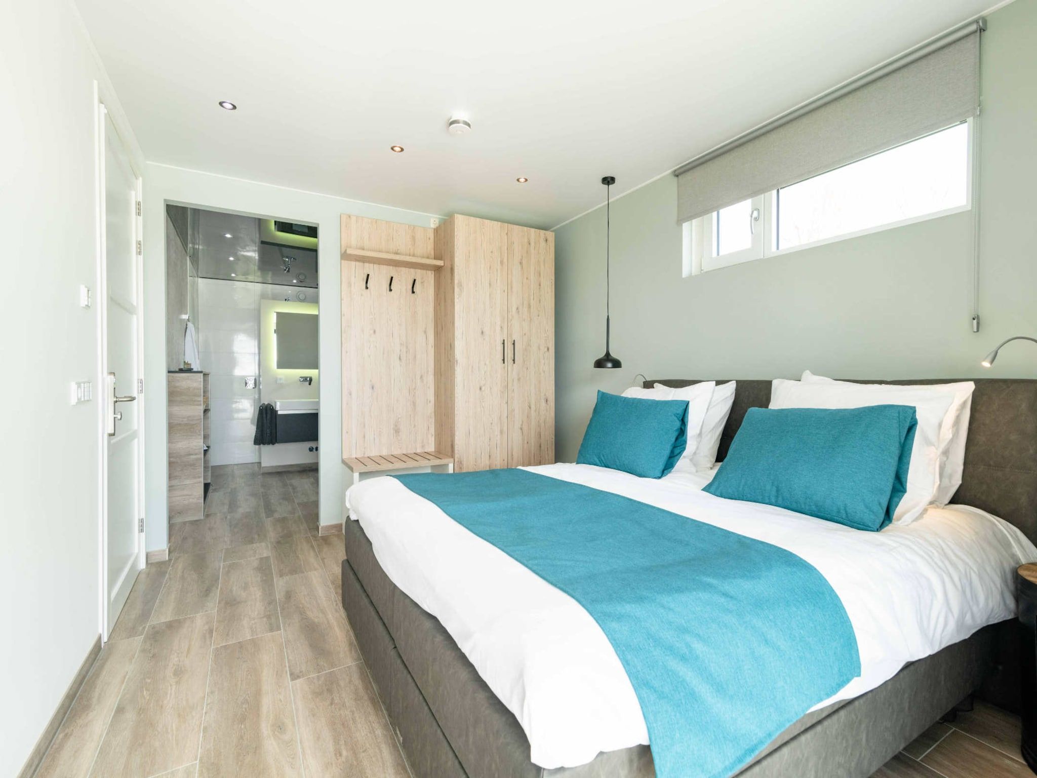 Een slaapkamer van Wellness at the Vecht - Ground floor in Dalfsen