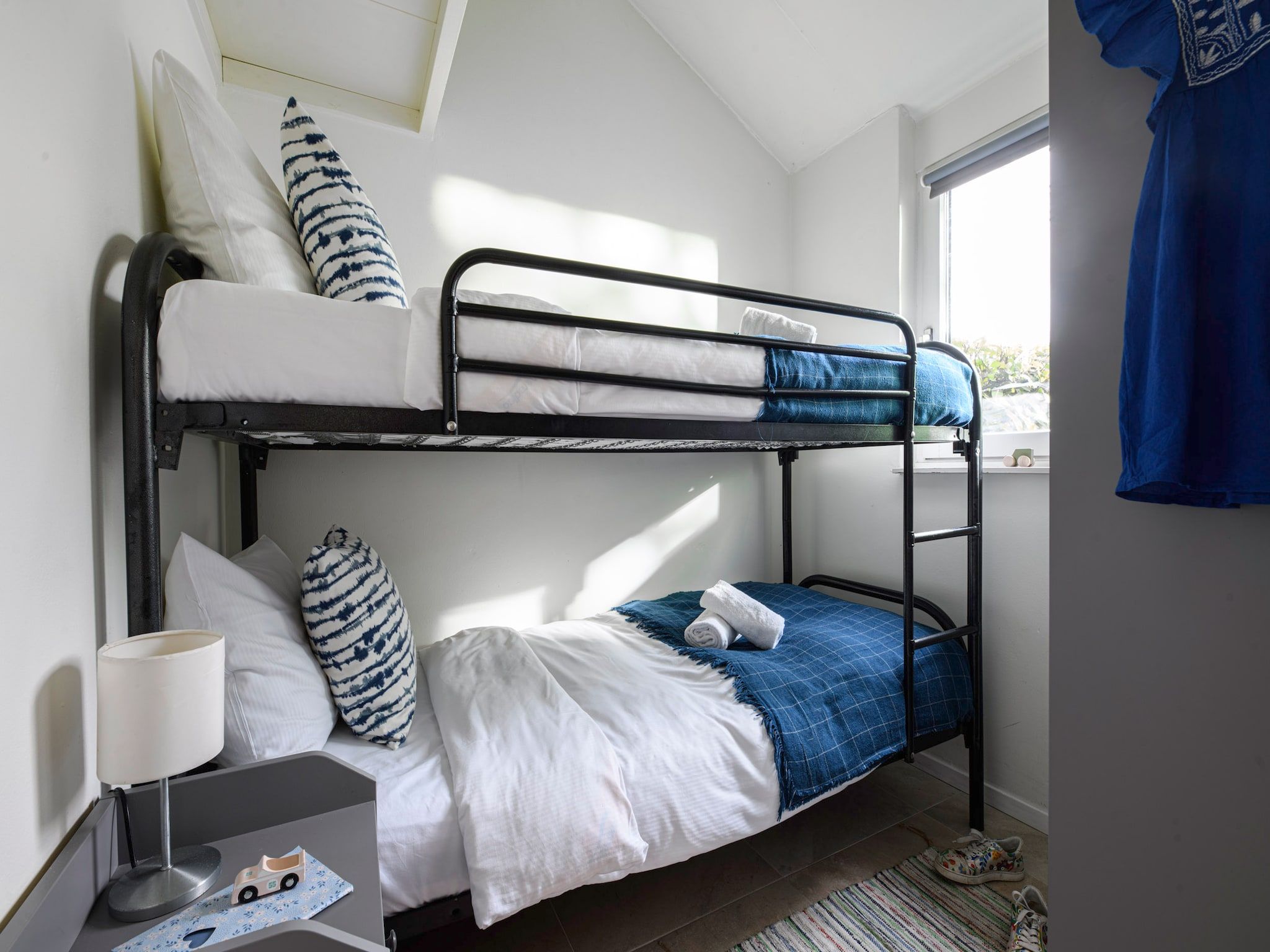 Een slaapkamer van Comfort Bungalow in Loosdrecht