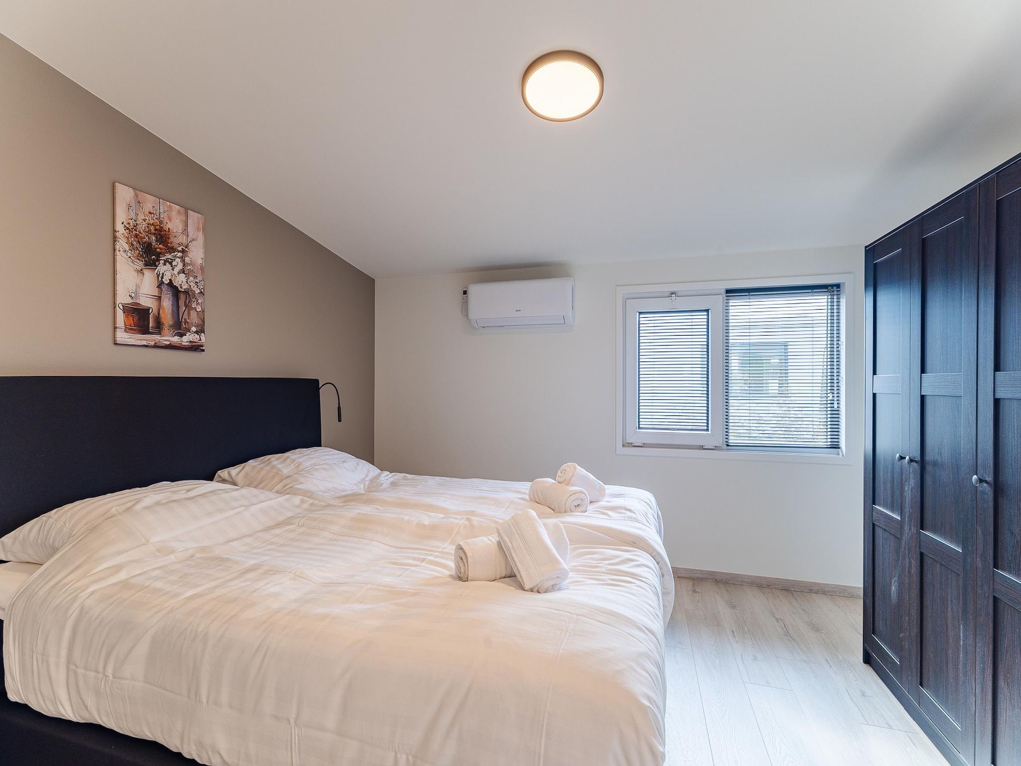 Een slaapkamer van Vakantiewoning - Keetenweg 10B - Stavenisse in Stavenisse