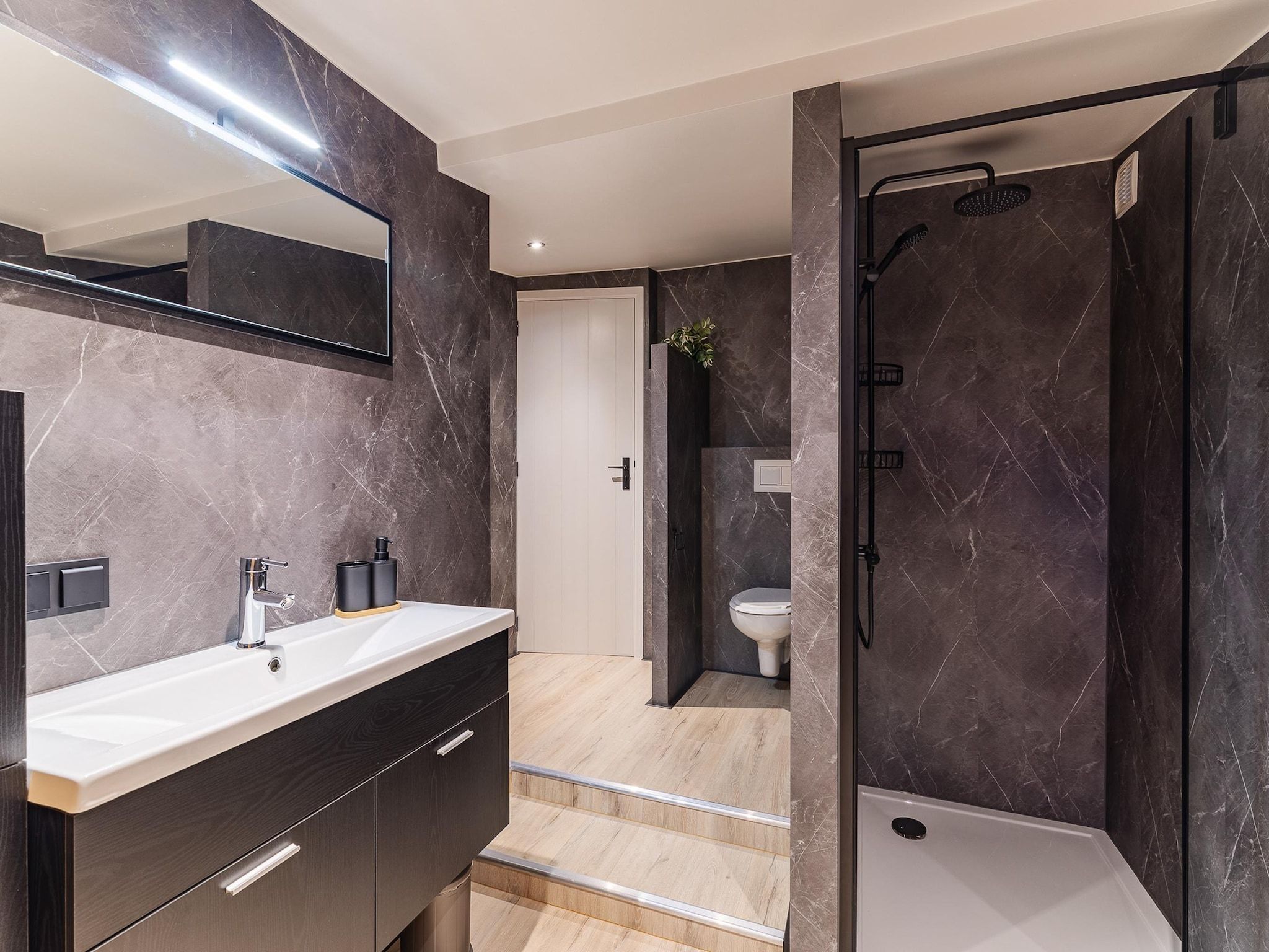 De badkamer van Vakantiewoning - Keetenweg 10B - Stavenisse in Stavenisse