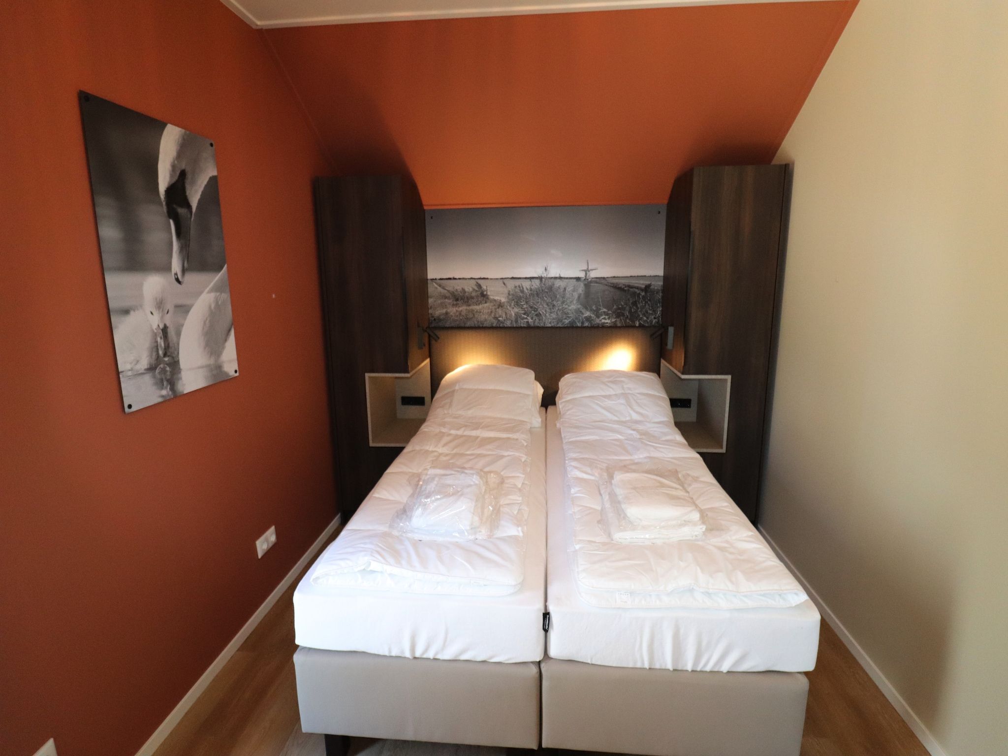 Een slaapkamer van Moderne hoekvilla middenin Friesland in leons