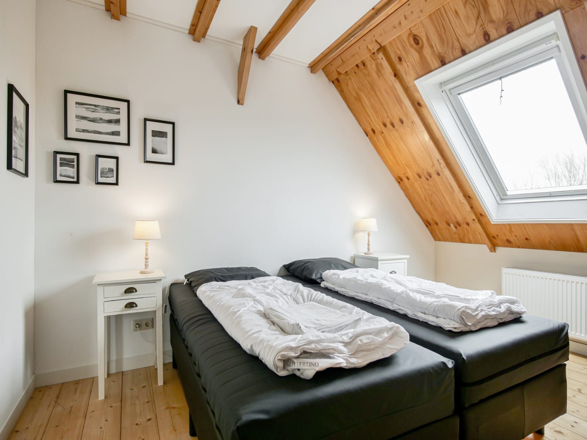 Een slaapkamer van Appartement Dars in Callantsoog