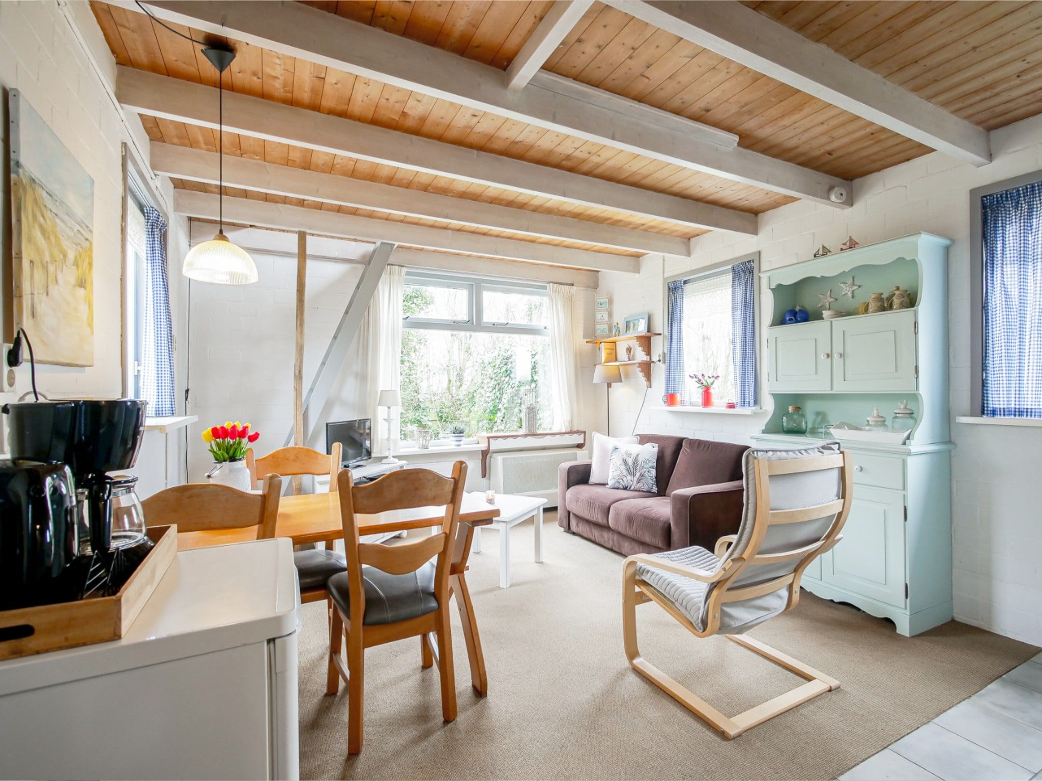 De woonkamer van Vakantiehuisje Vloed in Callantsoog