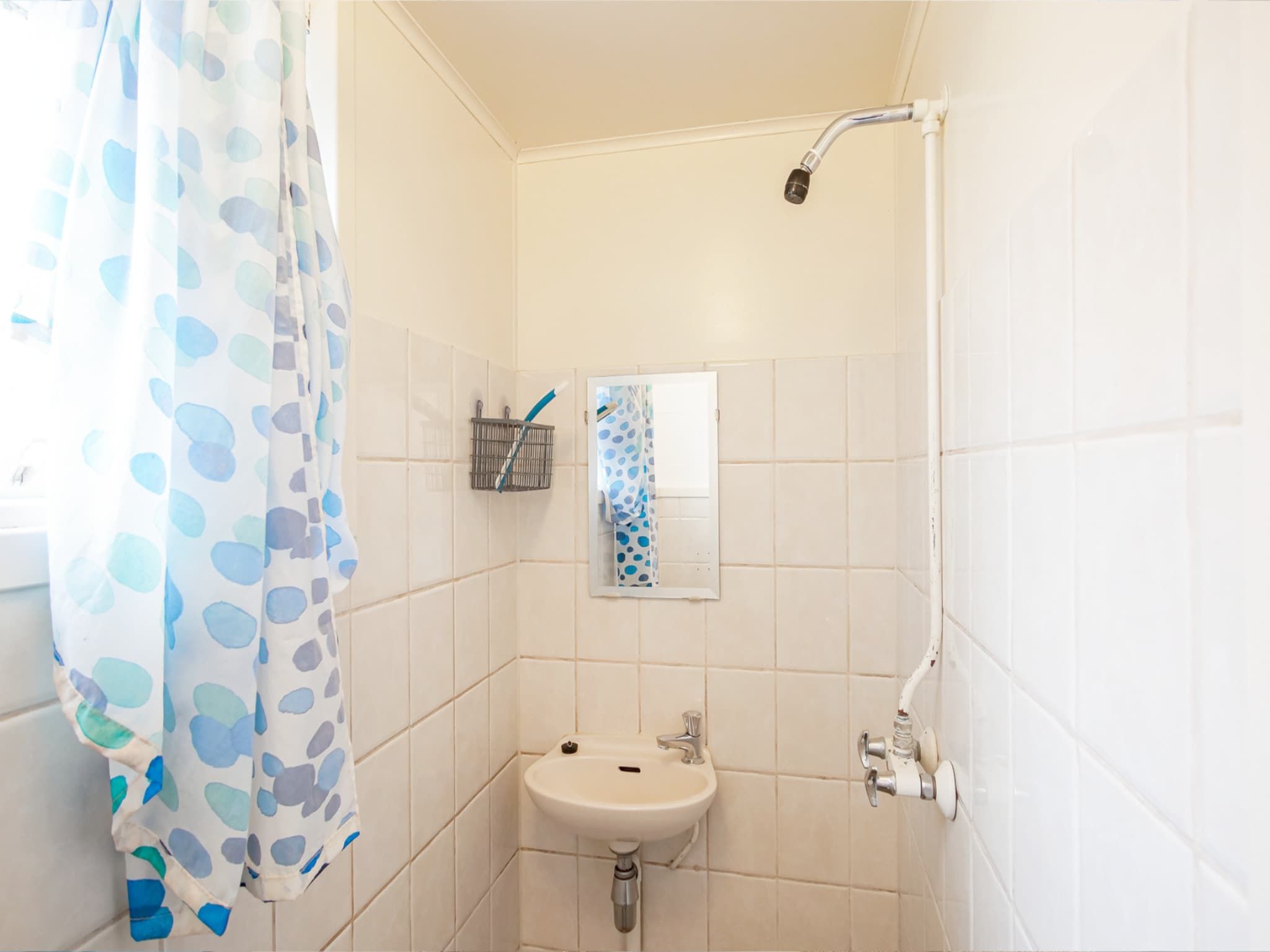 De badkamer van Vakantiehuisje Vloed in Callantsoog